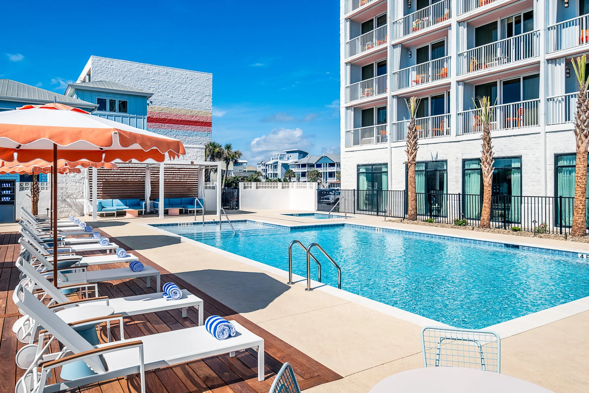 New Pool area photography at Golden Sands Hotel, showing thoughtful composition, branded consistency, fun, and uncluttered guest environment. Photographed by Lange Photo Studio. 