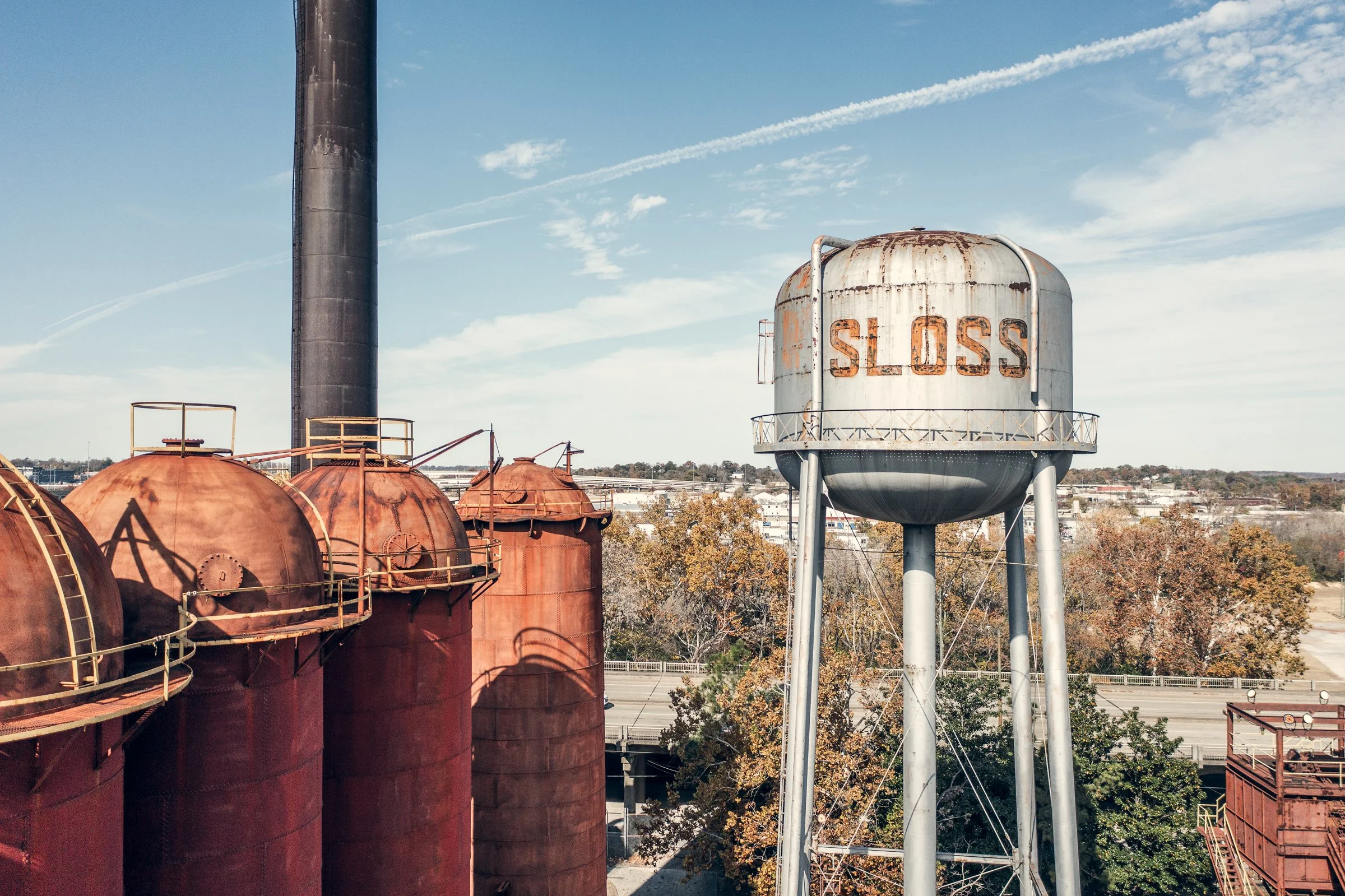 Sloss Furnaces, Birmingham, Alabama. Once the heart of the South's iron industry, these blast furnaces operated from 1882 to 1971, shaping Birmingham's identity as an industrial center. Now preserved as a National Historic Landmark, the site stands a