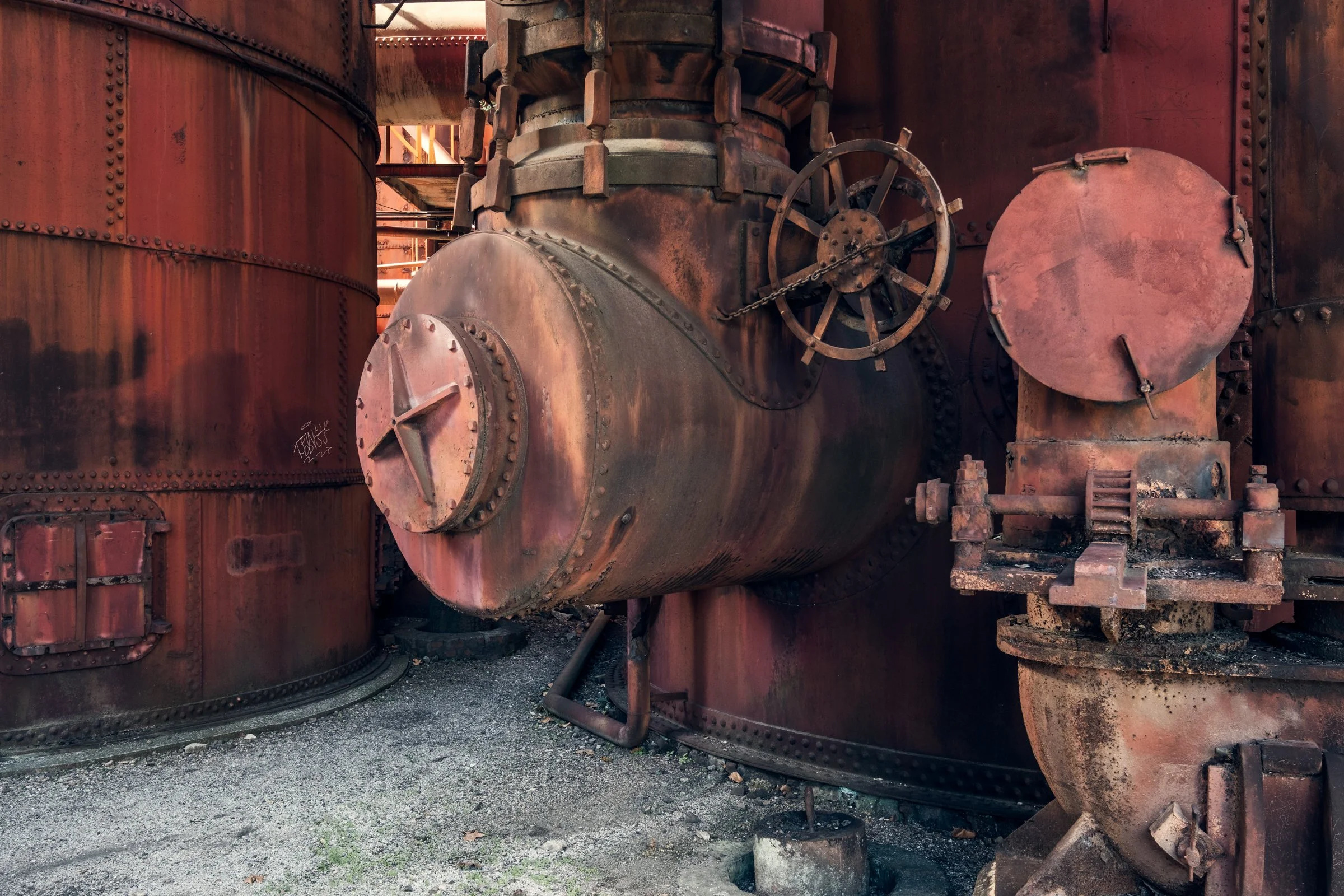Sloss Furnaces, Birmingham, Alabama. Once the heart of the South's iron industry, these blast furnaces operated from 1882 to 1971, shaping Birmingham's identity as an industrial center. Now preserved as a National Historic Landmark, the site stands a