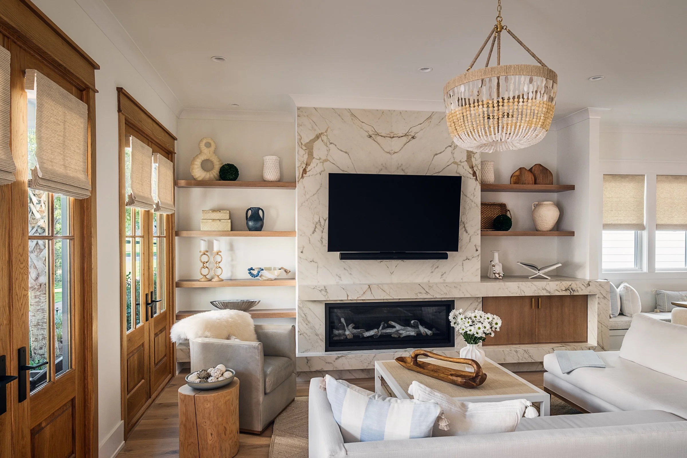 Dwelling Place Interiors luxury residential interior design project featuring a custom kitchen renovation, high-end cabinetry and millwork, detailed tilework, beautifully designed bathrooms, living spaces, bookshelves, and outdoor living areas, photo