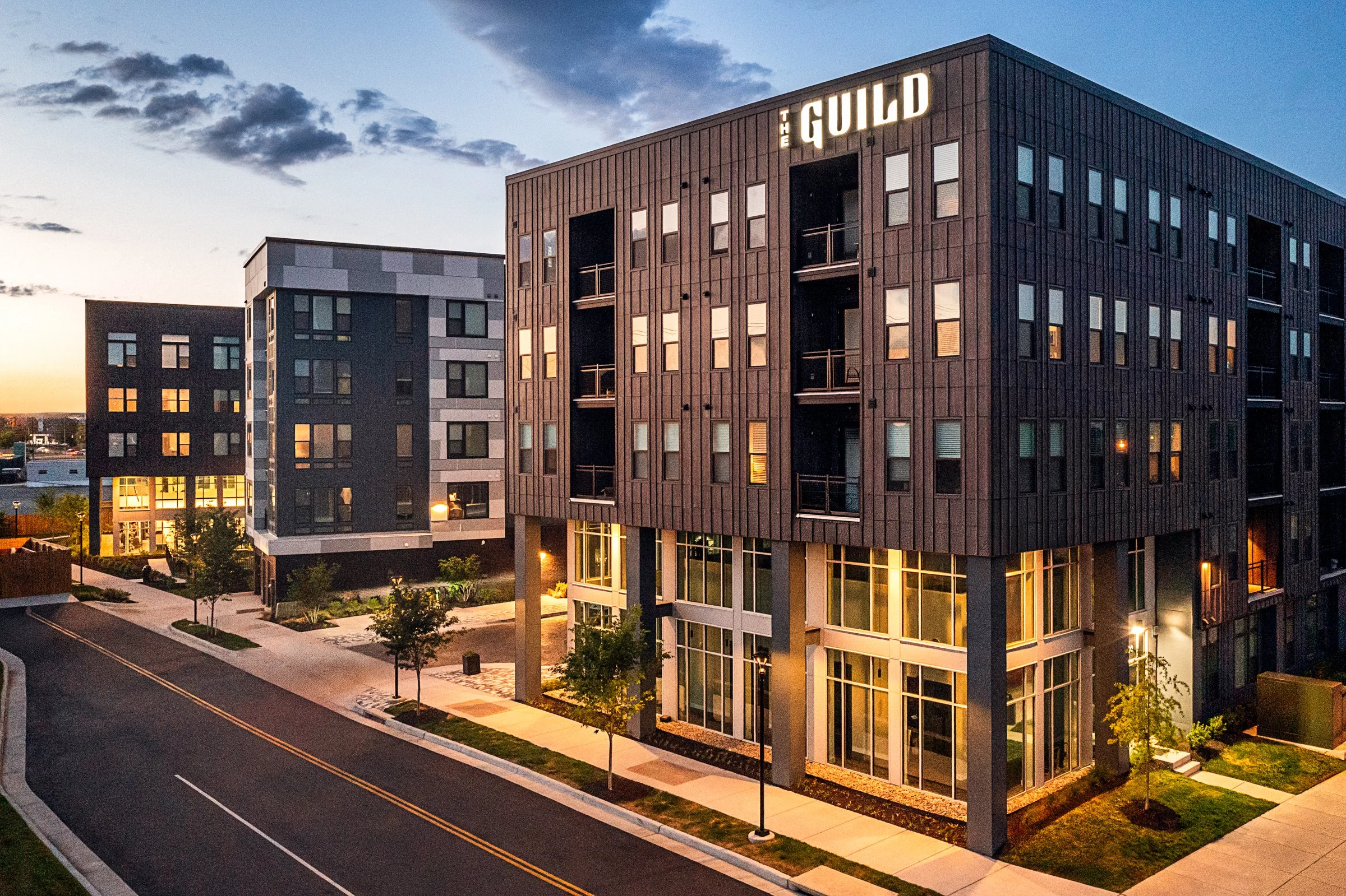 Architectural photography by Paul Lange of Lange Photo Studio, showcasing The Guild in Richmond, VA. The series captures the building's modern design, vibrant communal spaces, rooftop lounge, resort-style pool, highlighting the dynamic living experie