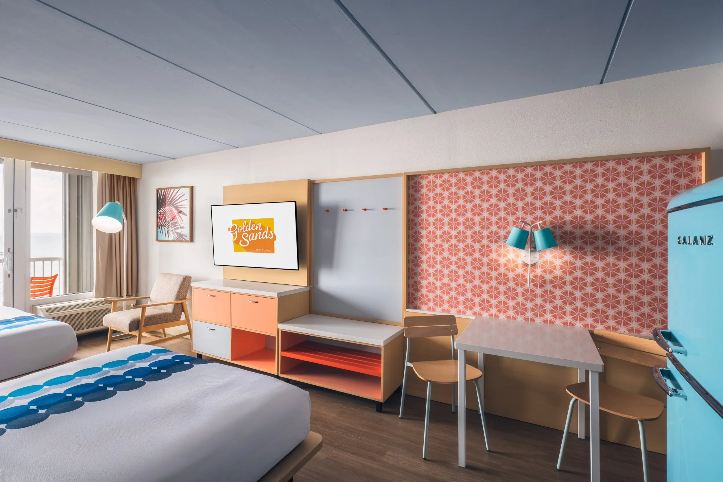 Photograph of guest room at Golden Sands Hotel, featuring crisp lighting, minimalist setup, and adherence to Hilton guest-ready standards.