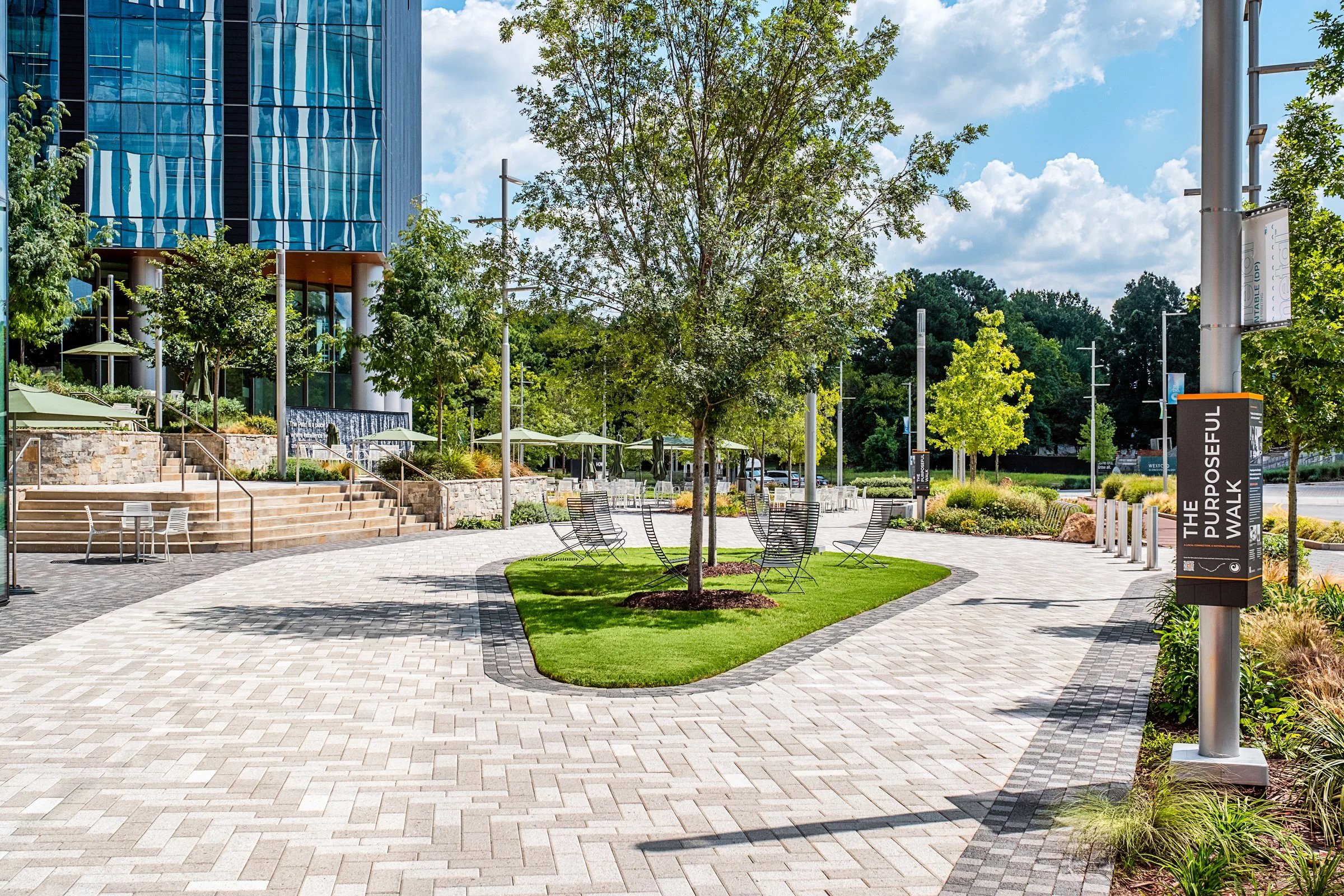Landscape architecture photography of The Pearl in Charlotte, North Carolina, commissioned by Kimley-Horn and photographed by Paul Lange of Lange Photo Studio. The project features landscaped public spaces, a terraced central plaza, and the Purposefu