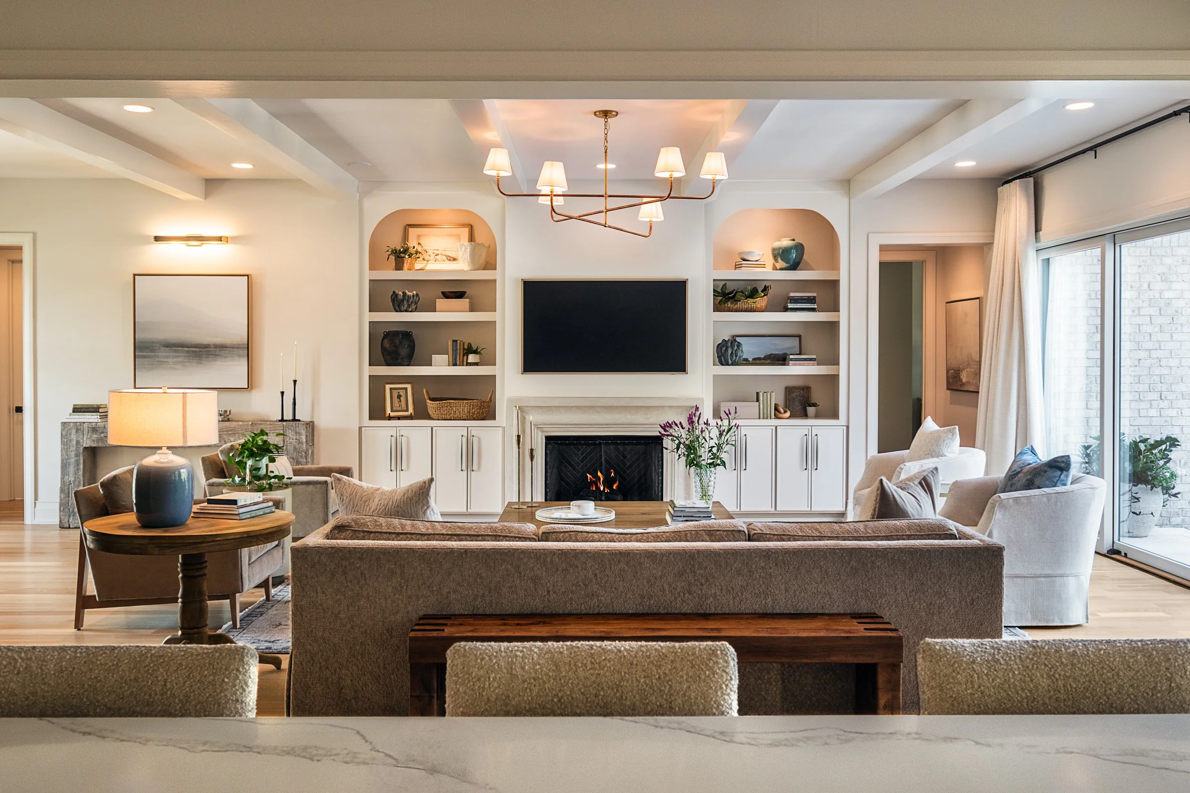 Architectural and interior photography of a custom home in Nashville, Tennessee, designed by Origin Architecture and photographed by Paul Lange of Lange Photo Studio. Warm light from the home’s fixtures highlights thoughtful architectural details and