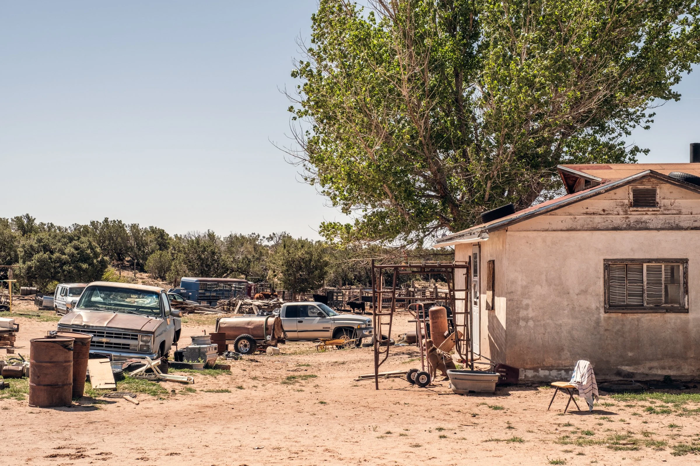 Hauling Life | Navajo Nation — Unified Metadata Paragraphs

Wayne Wilson and Joann Whiting collect water in Gallup, New Mexico at a community water source. The containers are filled, prepared, and loaded into their vehicle for transport across the Na
