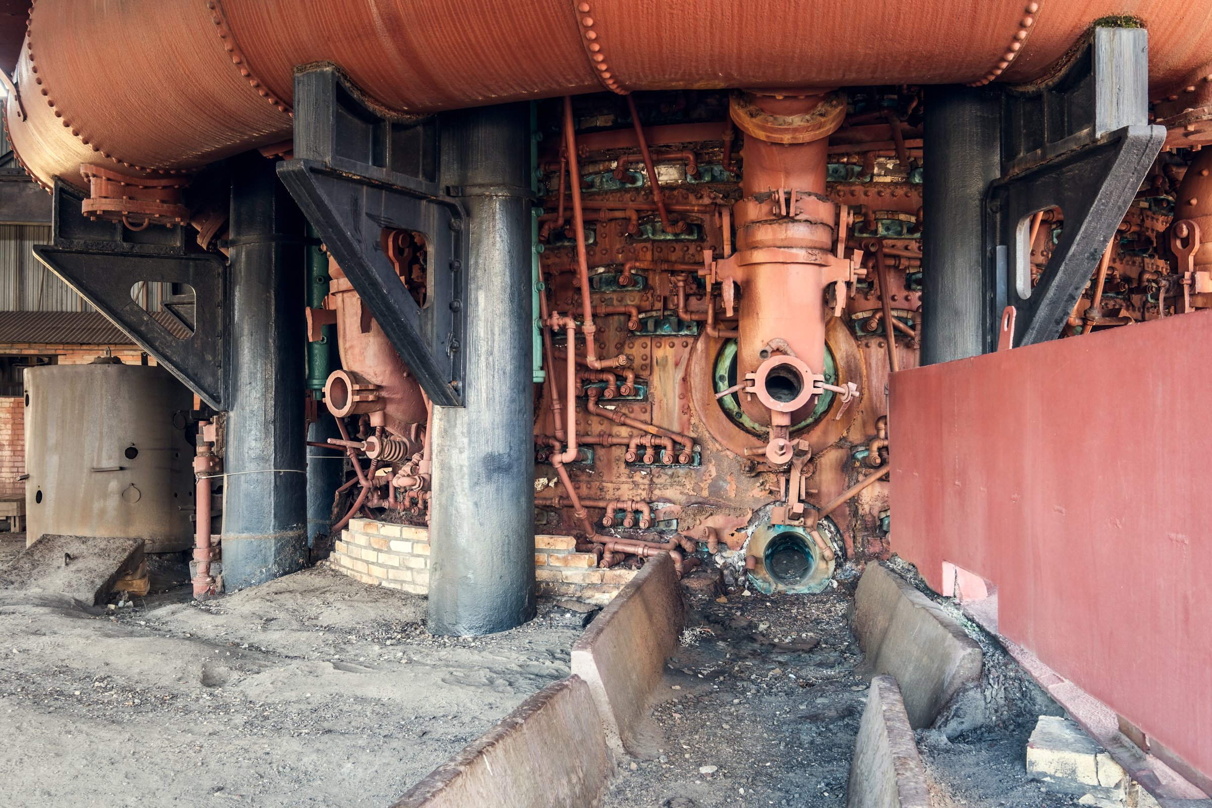 Sloss Furnaces, Birmingham, Alabama. Once the heart of the South's iron industry, these blast furnaces operated from 1882 to 1971, shaping Birmingham's identity as an industrial center. Now preserved as a National Historic Landmark, the site stands a