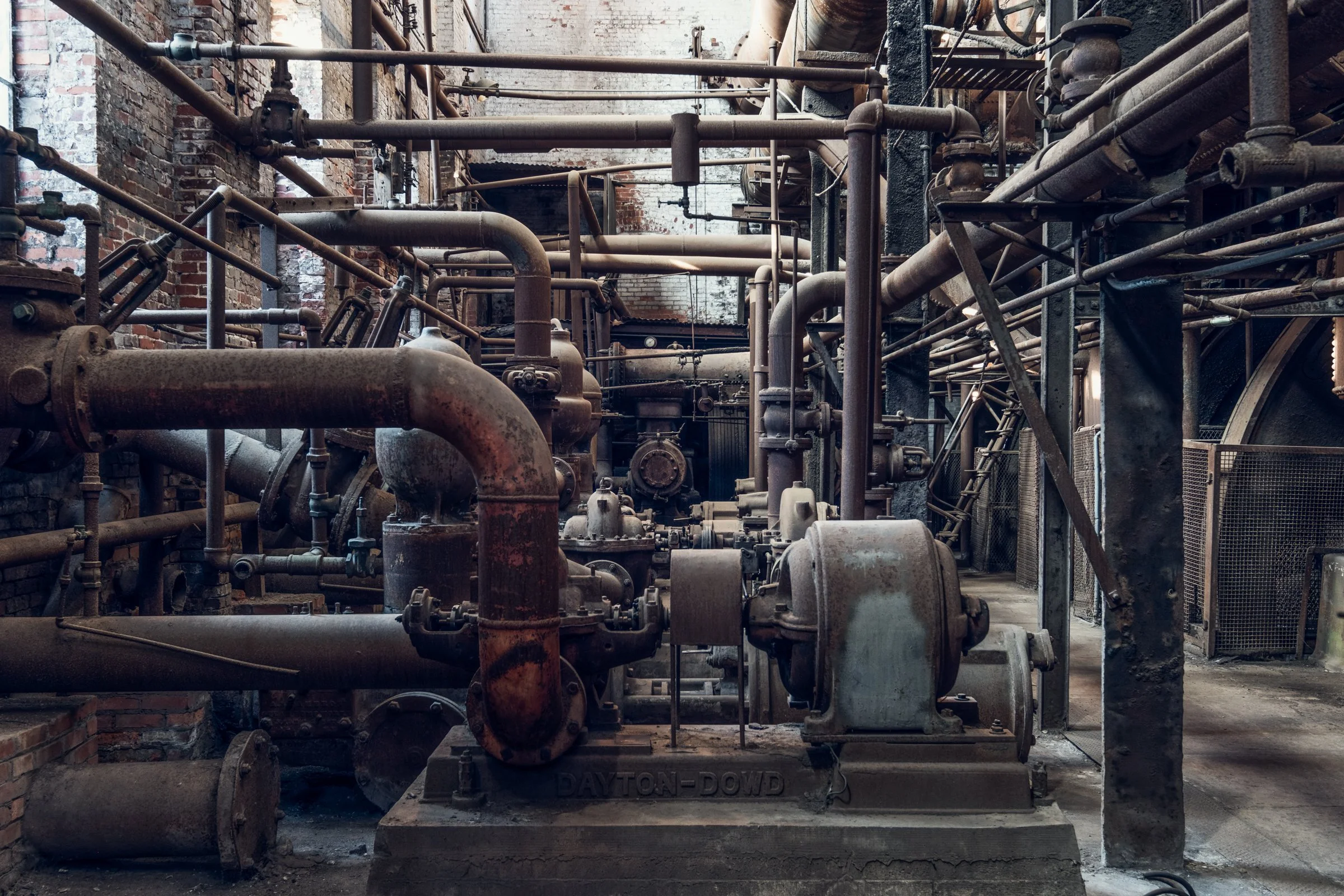 Sloss Furnaces, Birmingham, Alabama. Once the heart of the South's iron industry, these blast furnaces operated from 1882 to 1971, shaping Birmingham's identity as an industrial center. Now preserved as a National Historic Landmark, the site stands a