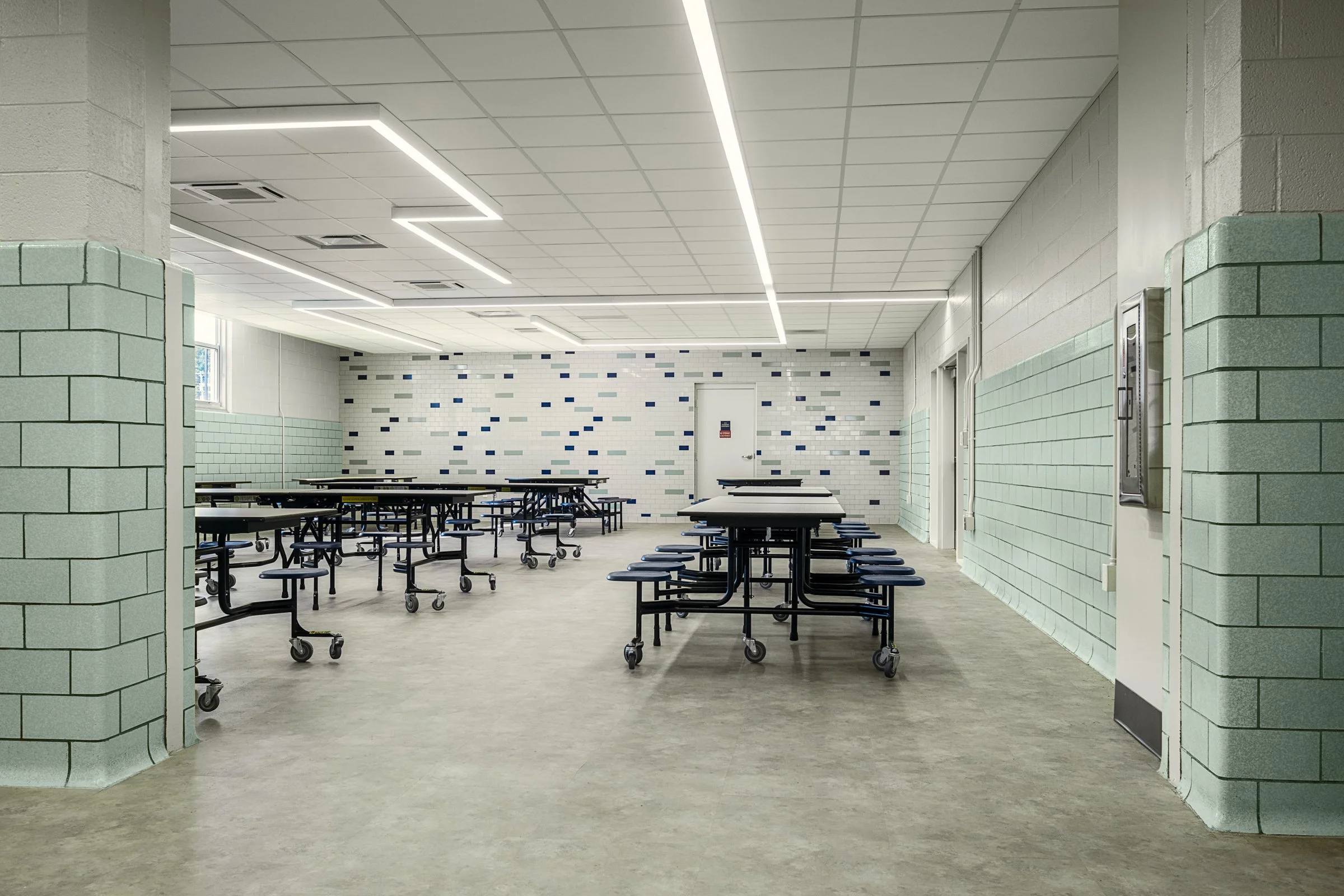 Interior view at Tri-cities Christian academy, highlighting [space/design feature] and the renovated student living environment. Completed by Johnson Architectue and photographed by Lange Photo Studio. 