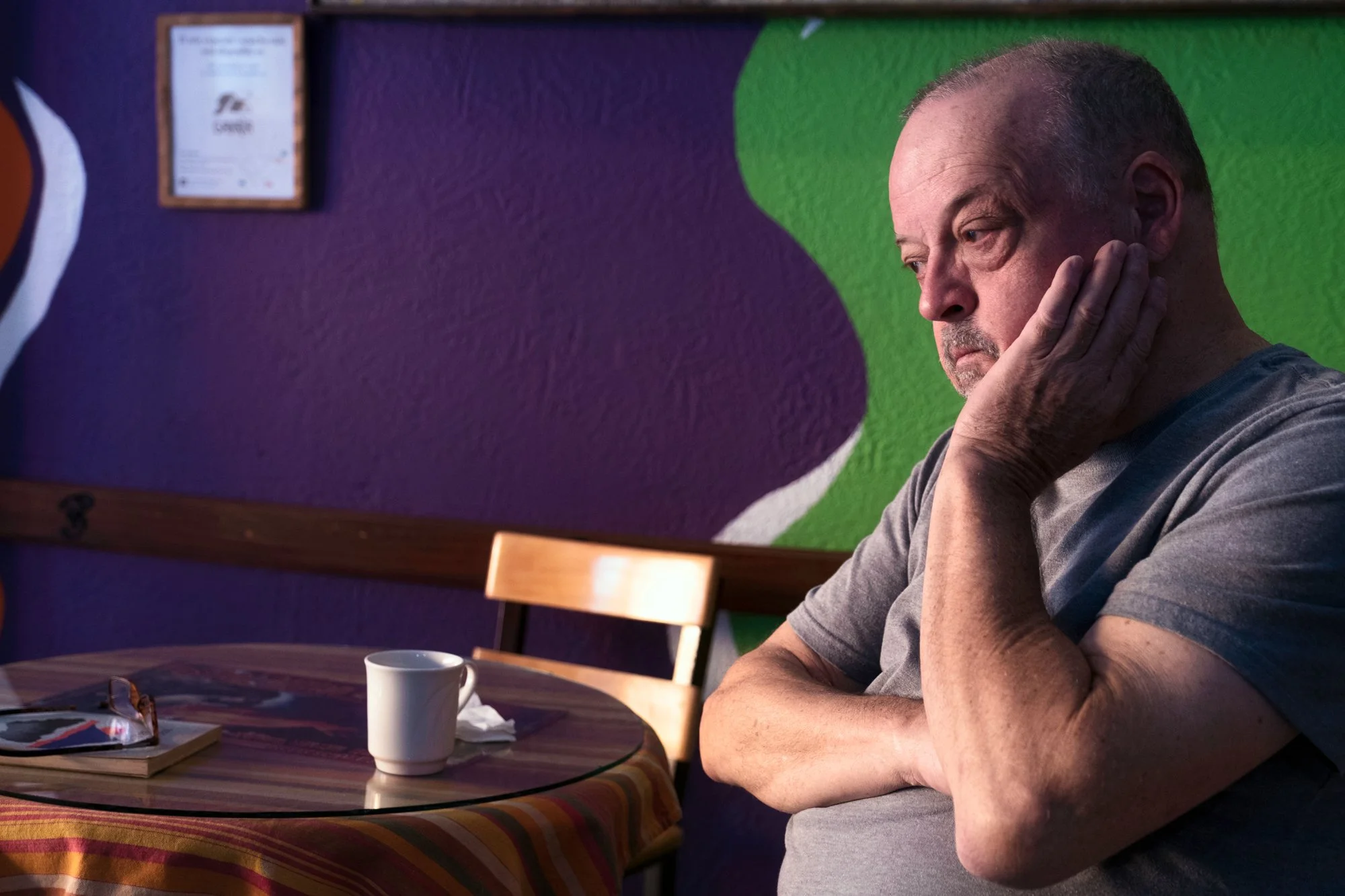 man reflecting over coffee in Guatemala