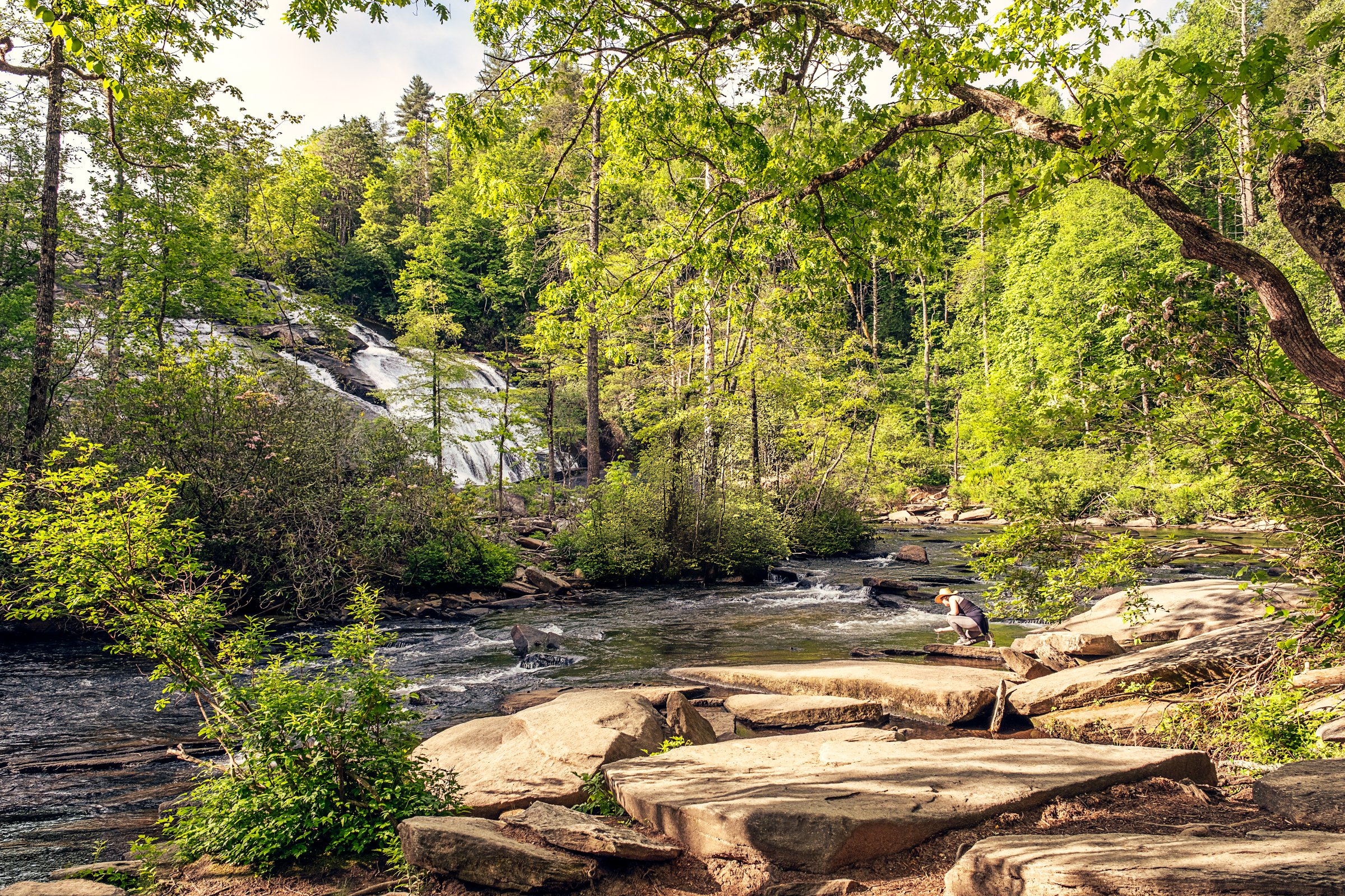 Hooker Falls and High Falls, two waterfalls in DuPont State Forest near Asheville, North Carolina. Photographed by Lange Photo Studio. 