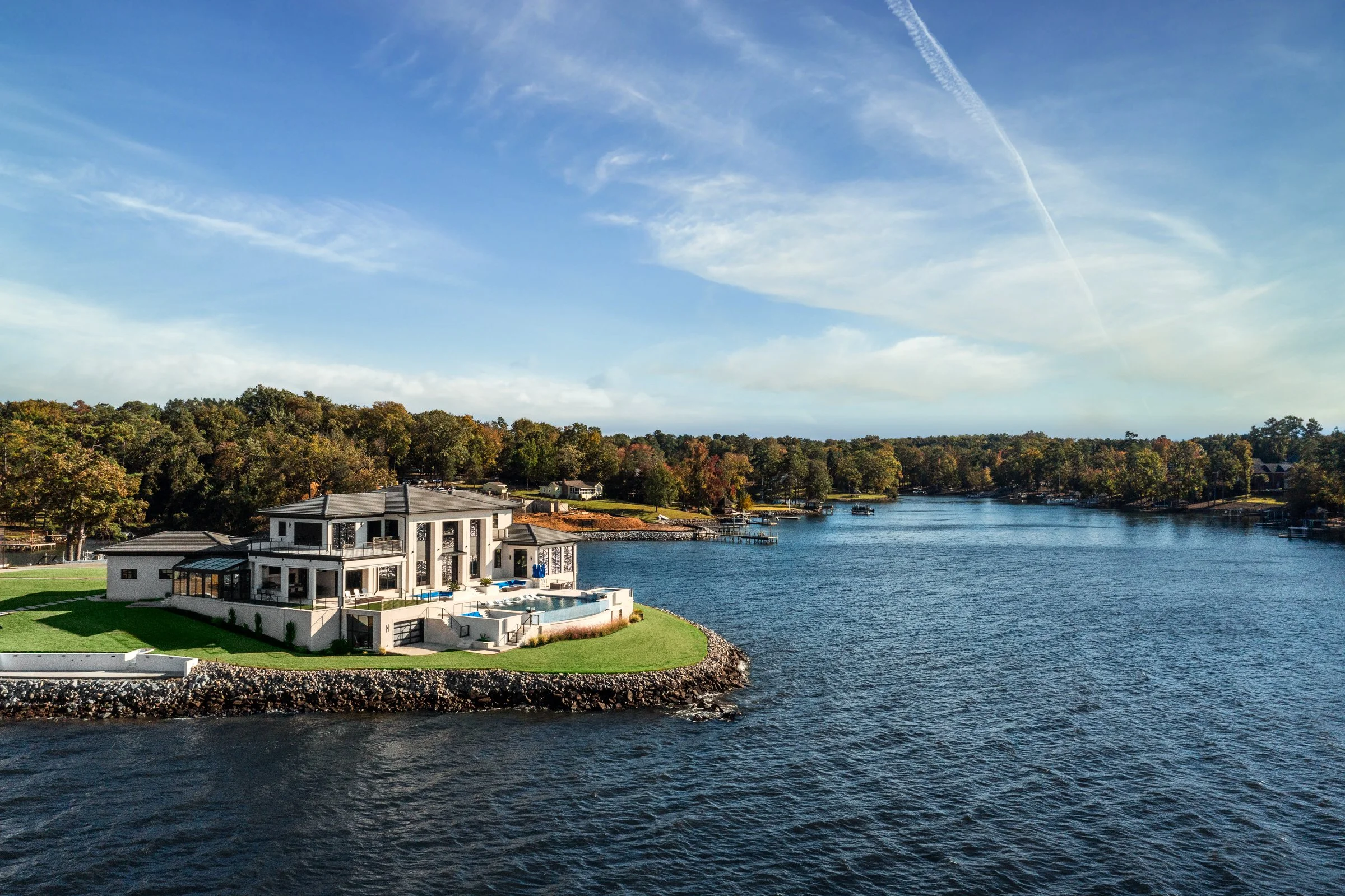 Architectural and interior photography of a customized lakefront home, highlighting design detail, atmosphere, infinity pool, and craftsmanship. Designed by COngaree Construction, photographed by Lange Photo Studio. 