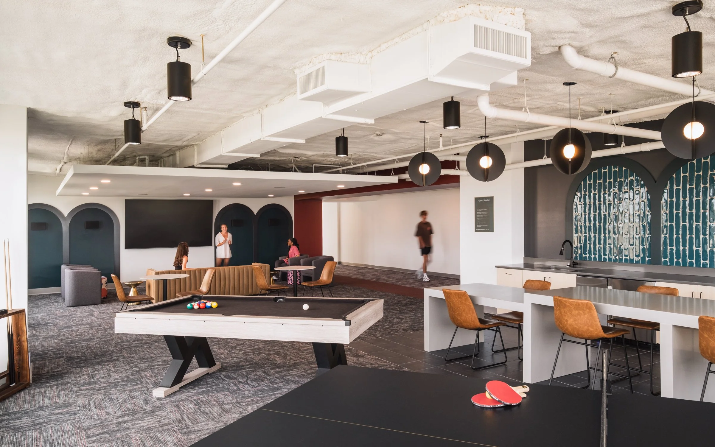 Architectural and lifestyle photography by Paul Lange of Lange Photo Studio, showcasing Gateway 737, a 940-bed student housing community near the University of South Carolina. The series captures the building's modern design, vibrant communal spaces,