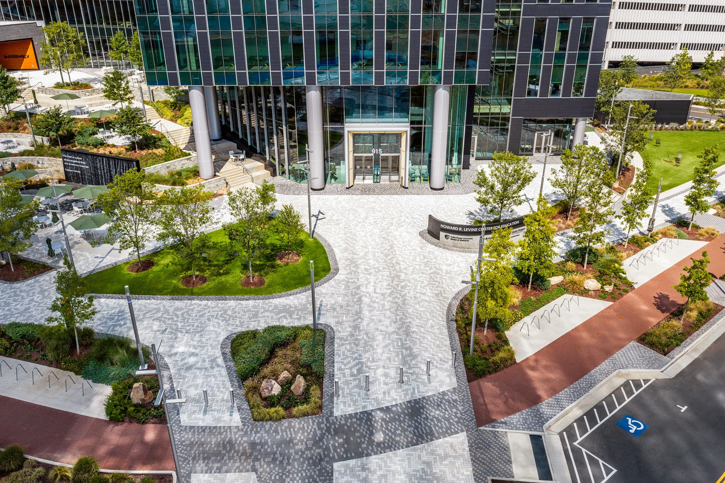Landscape architecture photography of The Pearl in Charlotte, North Carolina, commissioned by Kimley-Horn and photographed by Paul Lange of Lange Photo Studio. The project features landscaped public spaces, a terraced central plaza, and the Purposefu