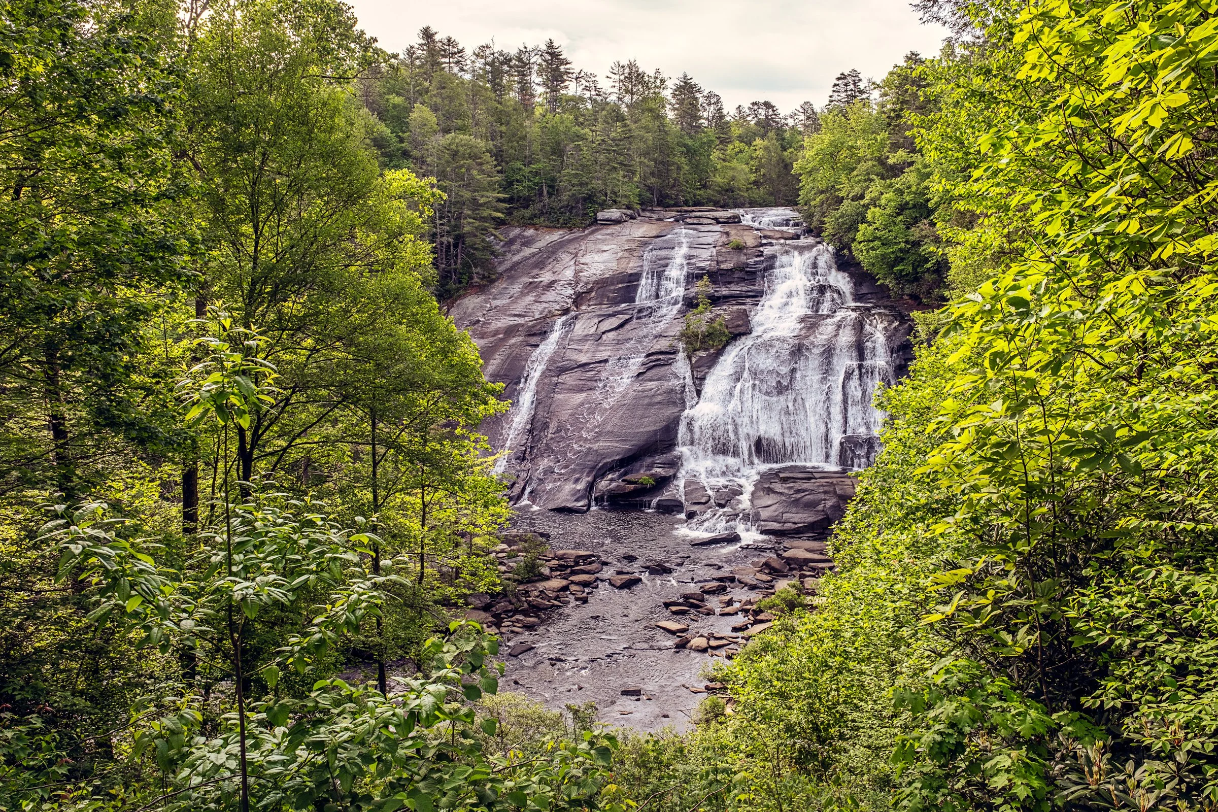 Hooker Falls and High Falls, two waterfalls in DuPont State Forest near Asheville, North Carolina. Photographed by Lange Photo Studio. 