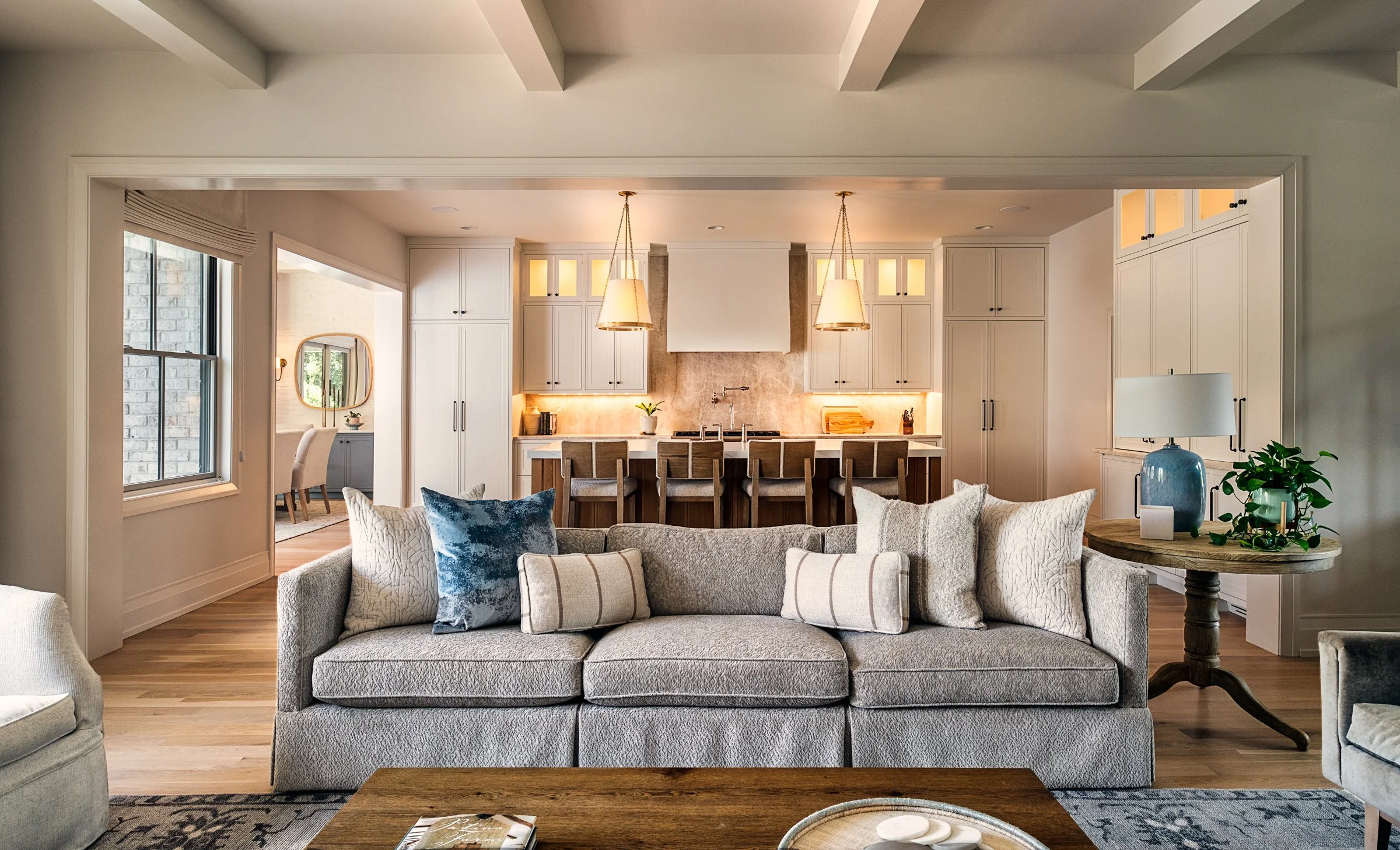 Architectural and interior photography of a custom home in Nashville, Tennessee, designed by Origin Architecture and photographed by Paul Lange of Lange Photo Studio. Warm light from the home’s fixtures highlights thoughtful architectural details and