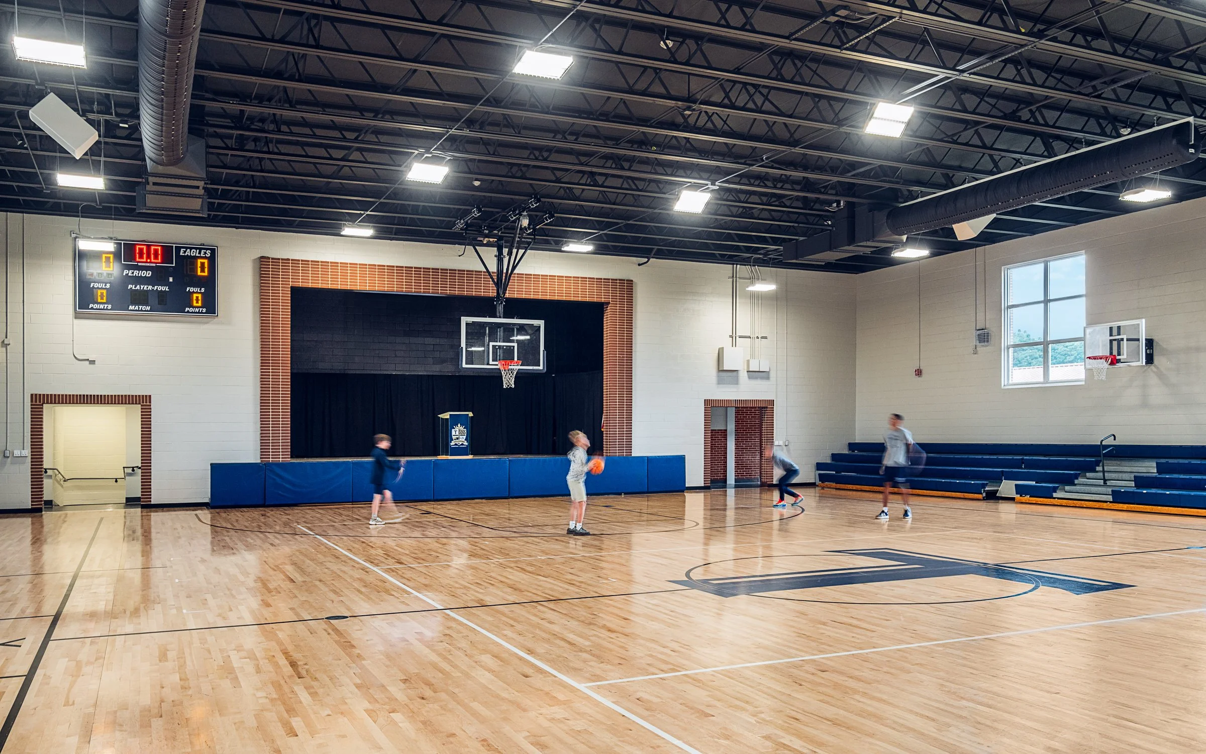 Interior view at Tri-cities Christian academy, highlighting [space/design feature] and the renovated student living environment. Completed by Johnson Architectue and photographed by Lange Photo Studio. 