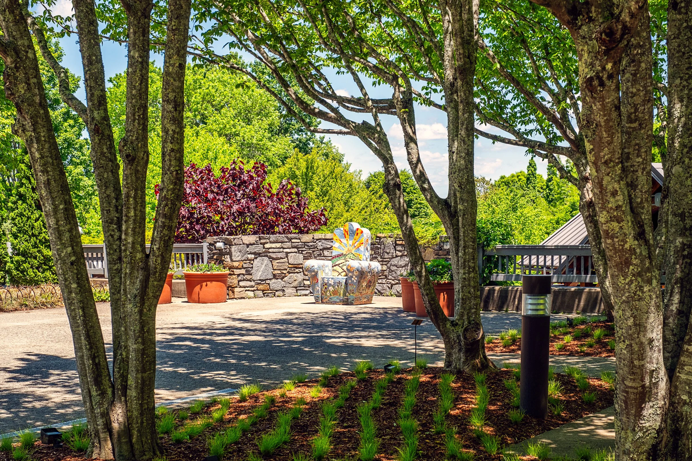 A quiet garden path and bonsai display at the North Carolina Arboretum near Asheville, North Carolina. Photographed by Lange Photo Studio. 