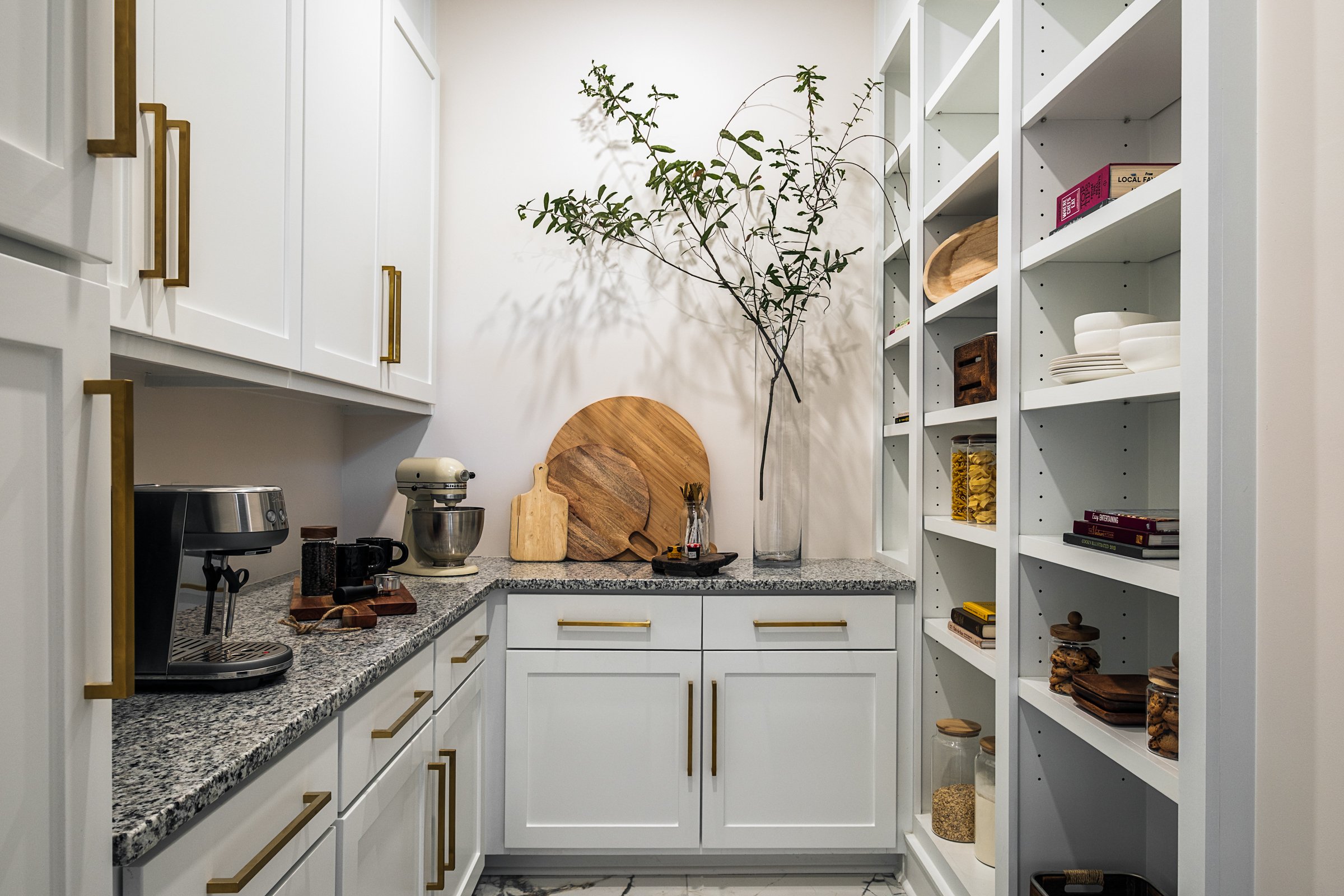 Architectural and interior photography of a customized lakefront home, highlighting design detail, atmosphere, infinity pool, and craftsmanship.