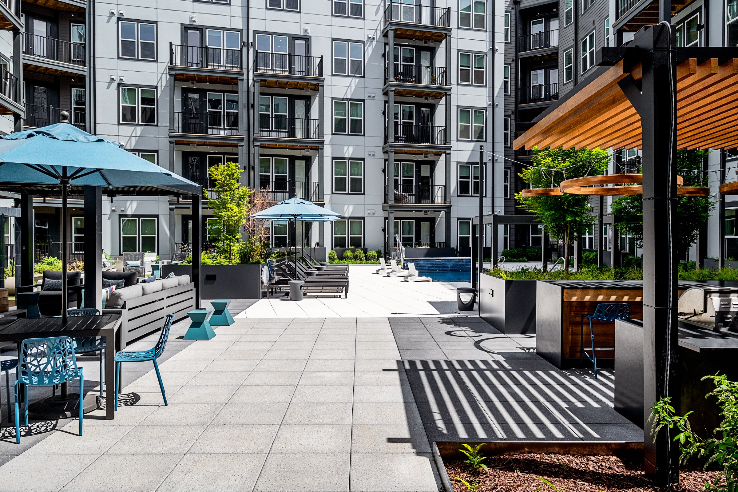 Architectural photography by Paul Lange of Lange Photo Studio, showcasing Ace Apartments in Richmond, VA. The series captures the building's modern design, vibrant communal spaces, rooftop lounge, resort-style pool, highlighting the dynami living exp