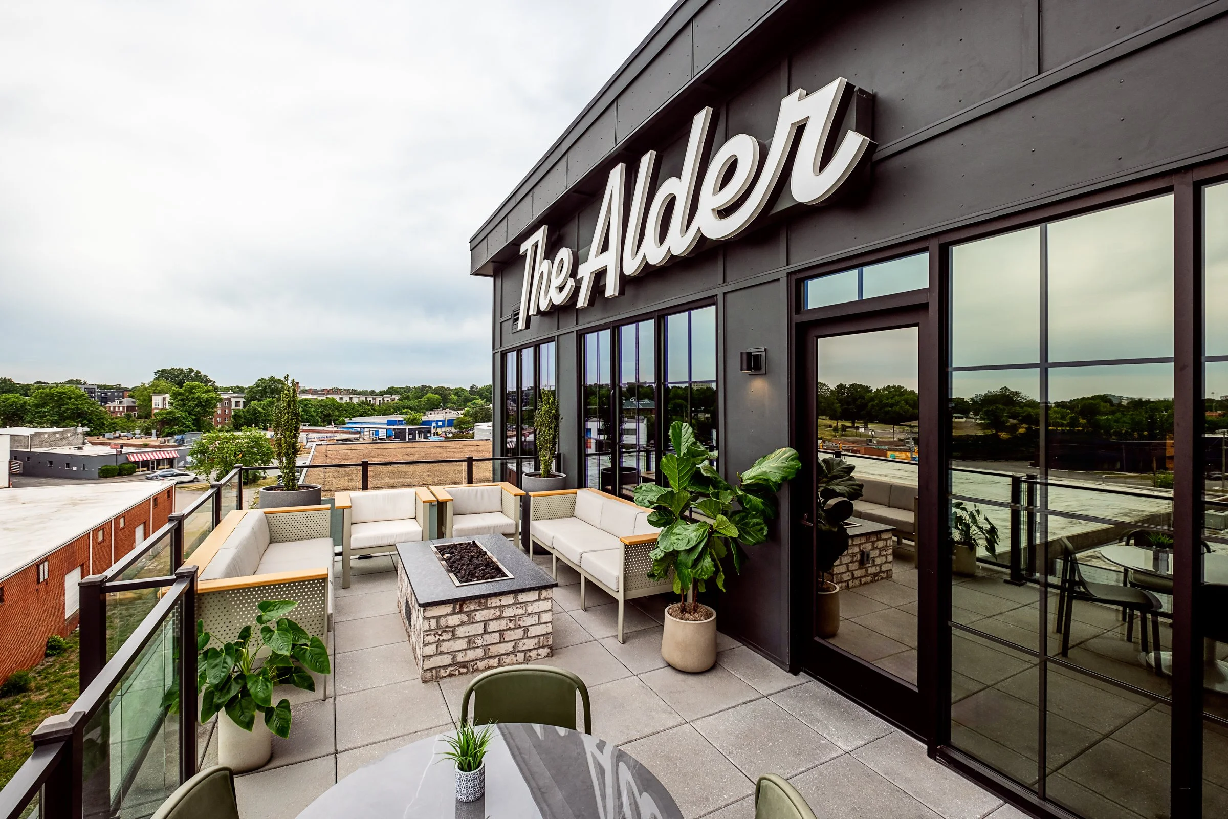 Architectural photography by Paul Lange of Lange Photo Studio, showcasing The Alder in Richmond, VA. The series captures the building's modern design, vibrant communal spaces, rooftop lounge, resort-style pool, highlighting the dynamic living experie