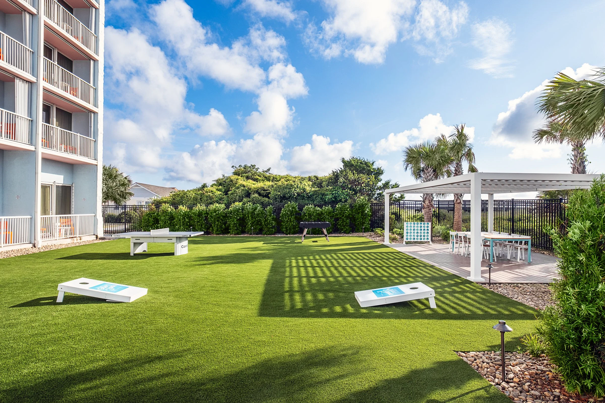 New Turf area photography at Golden Sands Hotel, showing thoughtful composition, branded consistency, fun, and uncluttered guest environment. Photographed by Lange Photo Studio. 