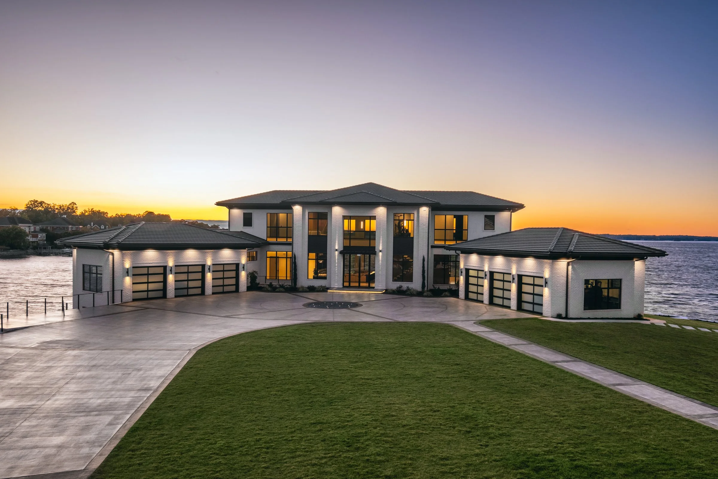 Architectural and interior photography of a customized lakefront home, highlighting design detail, atmosphere, infinity pool, and craftsmanship.