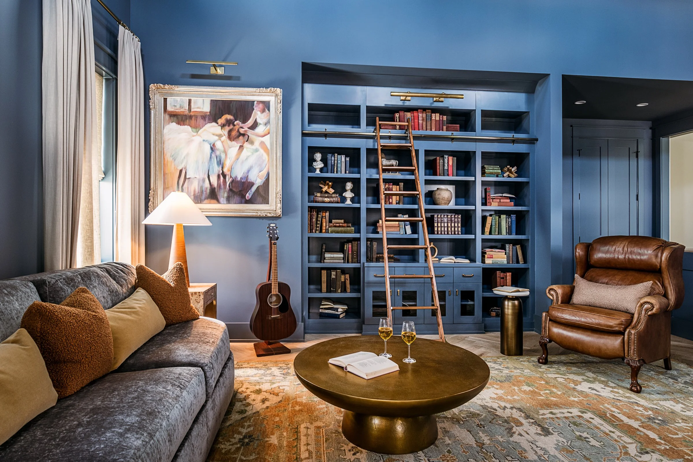 Dwelling Place Interiors luxury residential interior design project featuring a custom kitchen renovation, high-end cabinetry and millwork, detailed tilework, beautifully designed bathrooms, living spaces, bookshelves, and outdoor living areas, photo