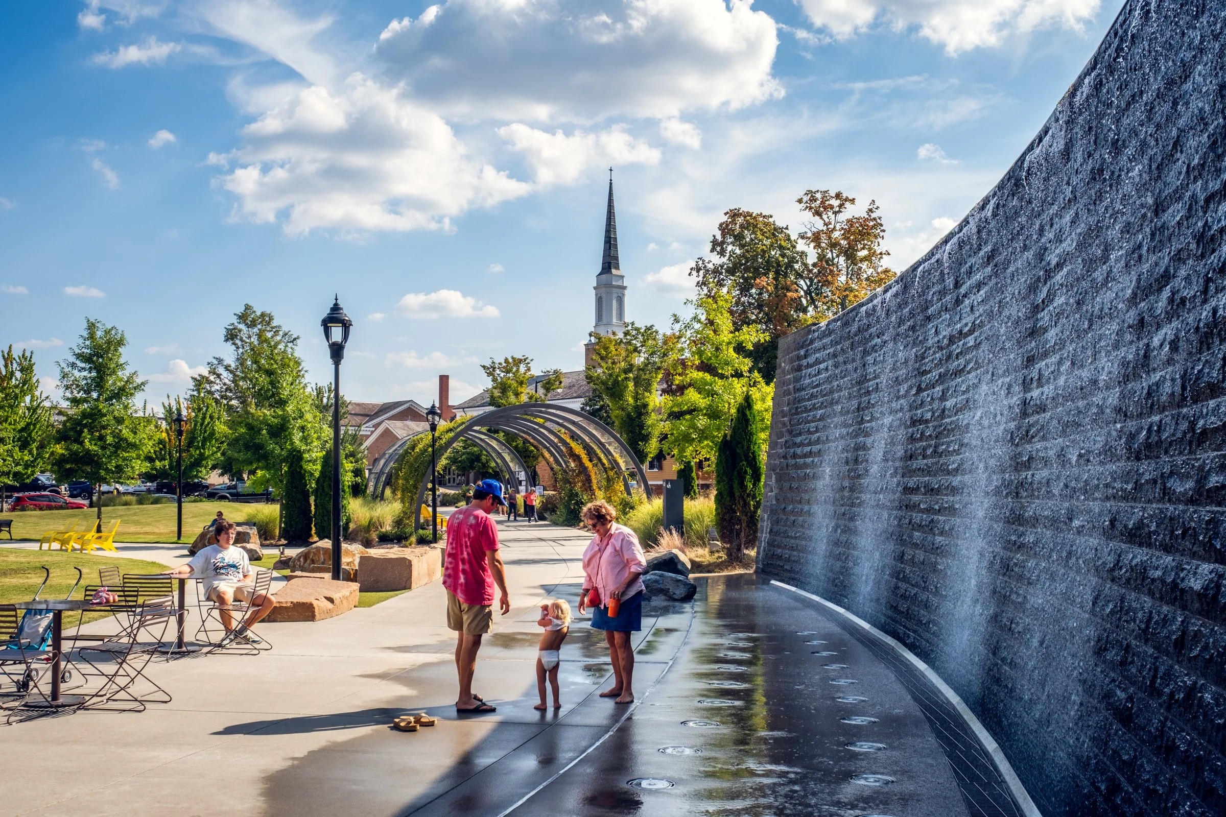 Belltower Green in Salisbury, NC highlighting its modern architecture, public use, and urban setting. Created by Lange Photo Studio.