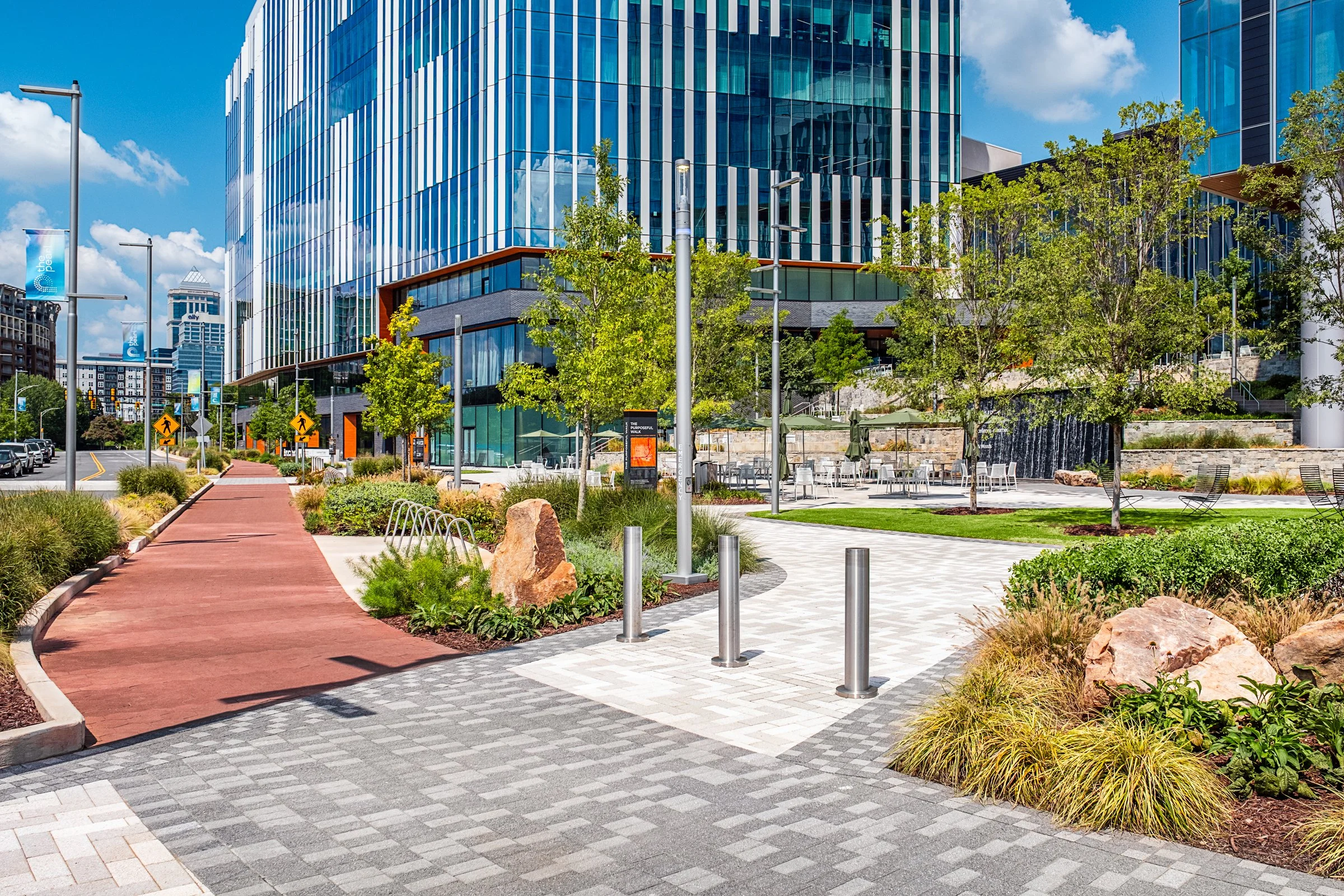 Landscape architecture photography of The Pearl in Charlotte, North Carolina, commissioned by Kimley-Horn and photographed by Paul Lange of Lange Photo Studio. The project features landscaped public spaces, a terraced central plaza, and the Purposefu