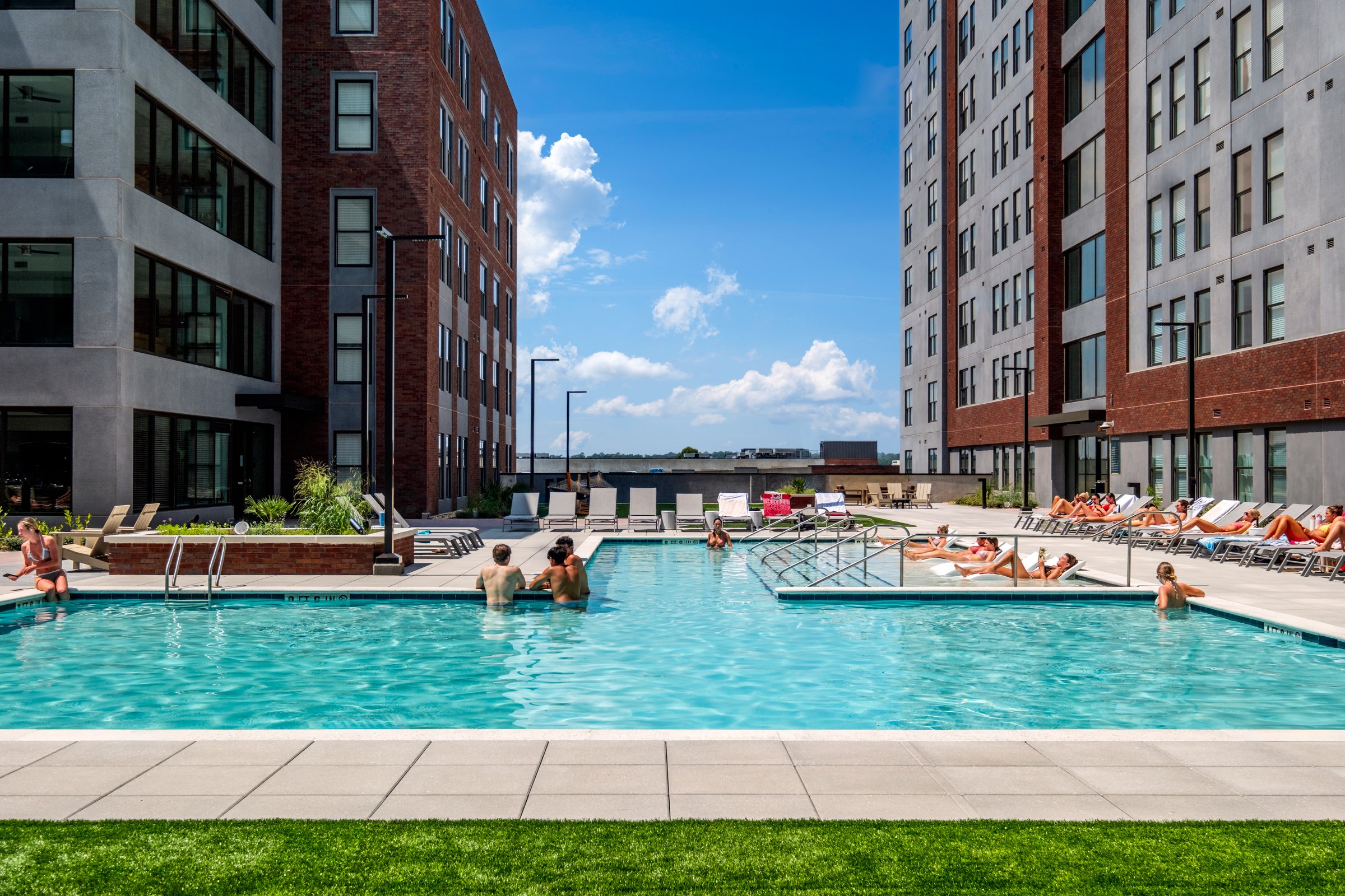 Architectural and lifestyle photography by Paul Lange of Lange Photo Studio, showcasing Gateway 737, a 940-bed student housing community near the University of South Carolina. The series captures the building's modern design, vibrant communal spaces,