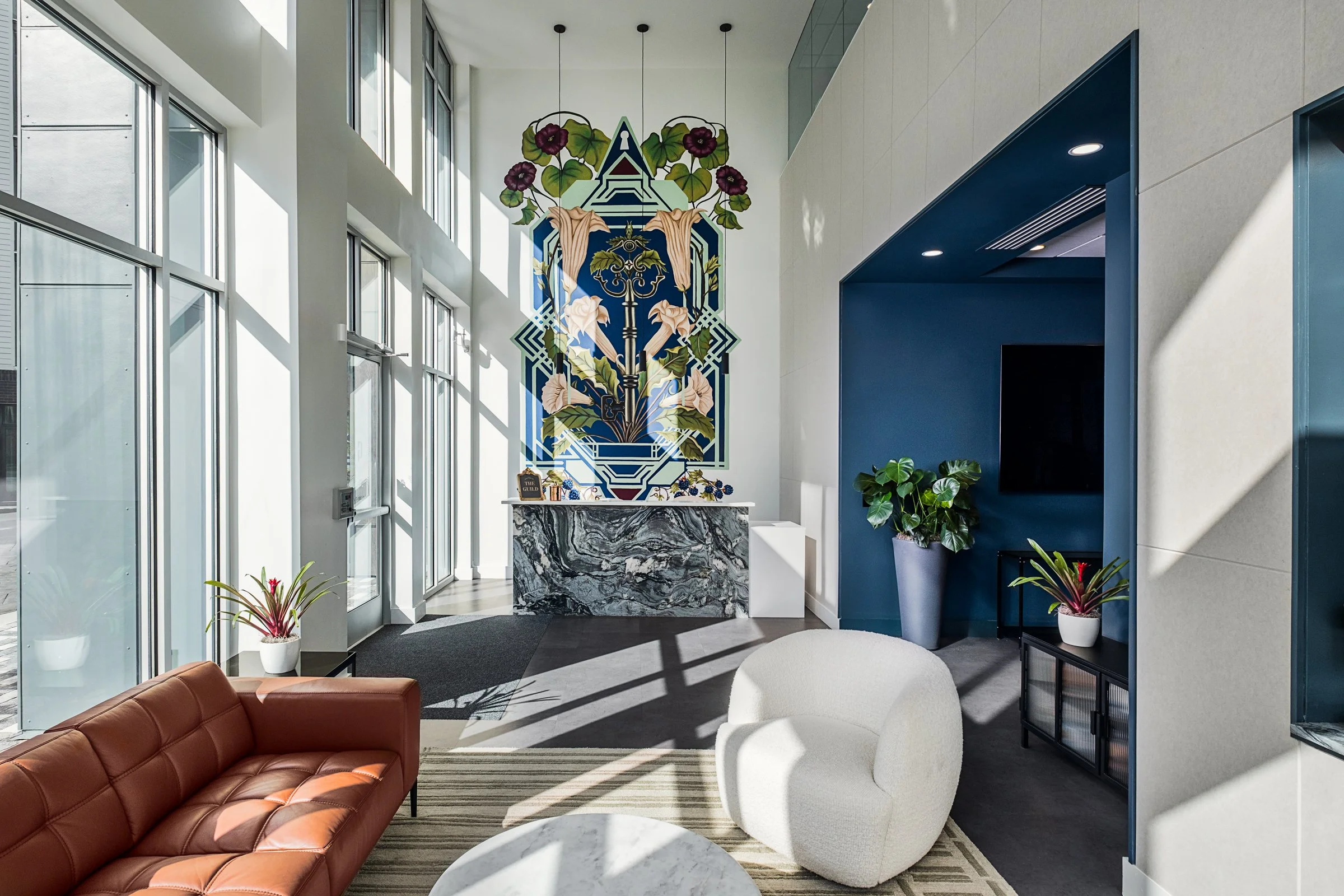 Architectural photography by Paul Lange of Lange Photo Studio, showcasing The Guild in Richmond, VA. The series captures the building's modern design, vibrant communal spaces, rooftop lounge, resort-style pool, highlighting the dynamic living experie