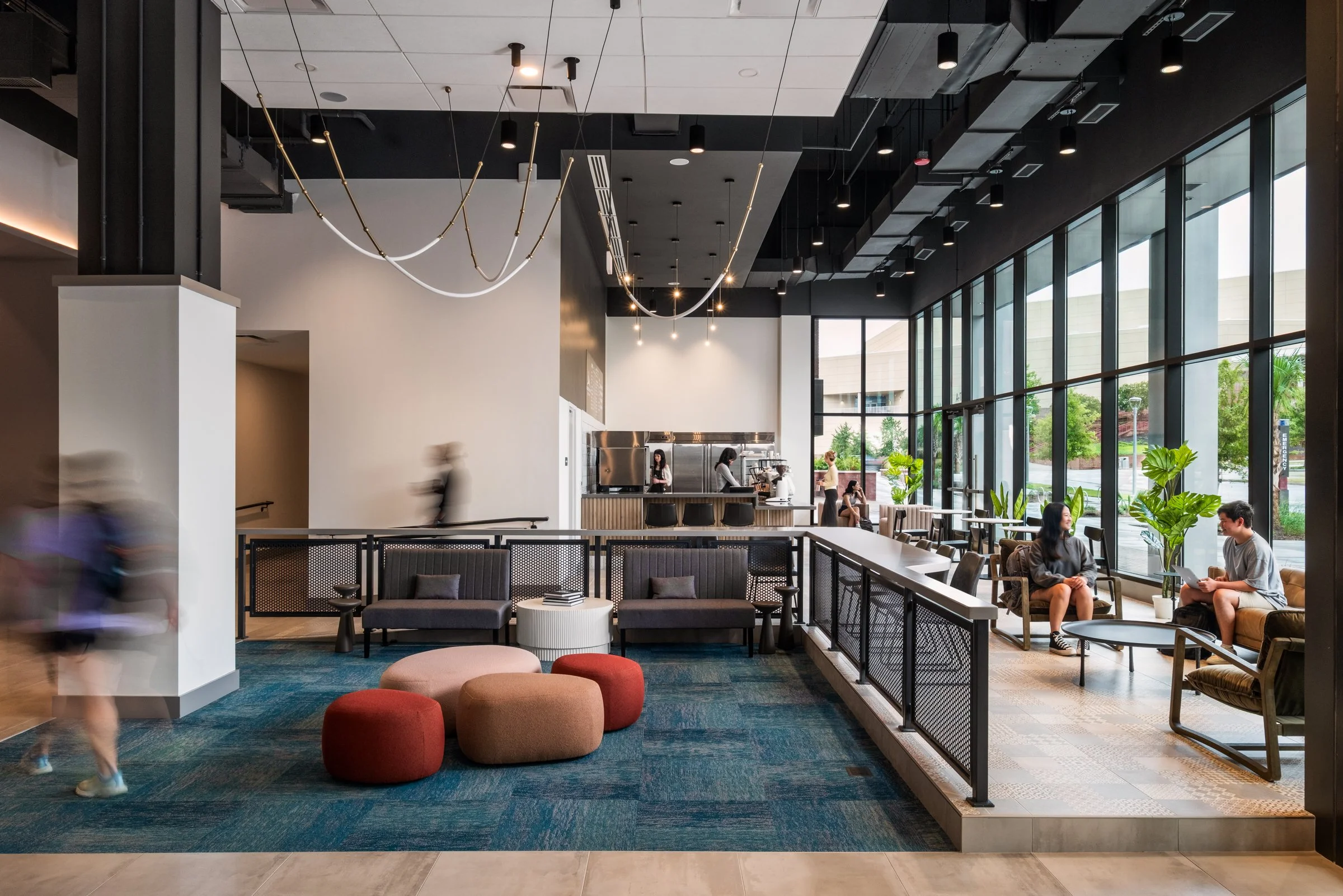 Architectural and lifestyle photography by Paul Lange of Lange Photo Studio, showcasing Gateway 737, a 940-bed student housing community near the University of South Carolina. The series captures the building's modern design, vibrant communal spaces,