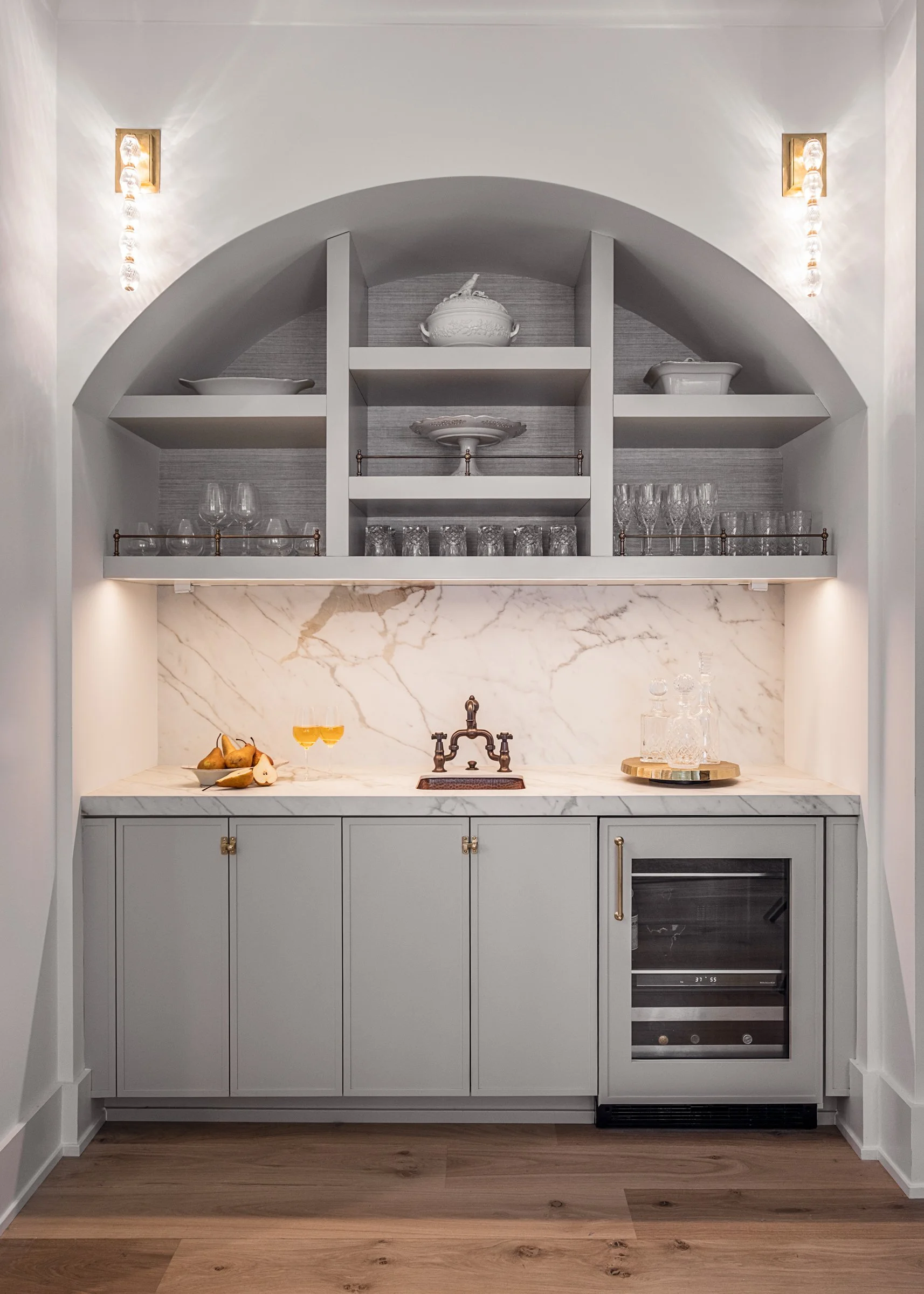 Dwelling Place Interiors luxury residential interior design project featuring a custom kitchen renovation, high-end cabinetry and millwork, detailed tilework, beautifully designed bathrooms, living spaces, bookshelves, and outdoor living areas, photo
