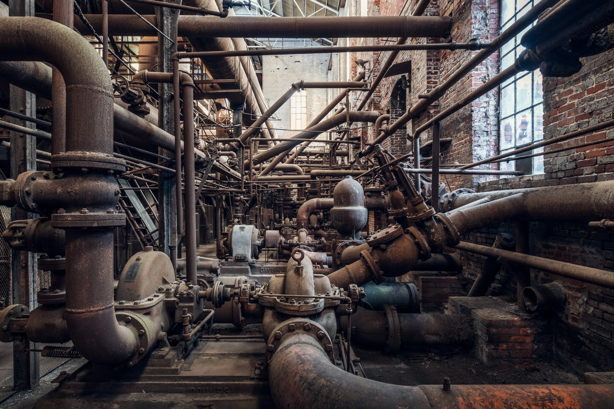 Sloss Furnaces, Birmingham, Alabama. Once the heart of the South's iron industry, these blast furnaces operated from 1882 to 1971, shaping Birmingham's identity as an industrial center. Now preserved as a National Historic Landmark, the site stands a
