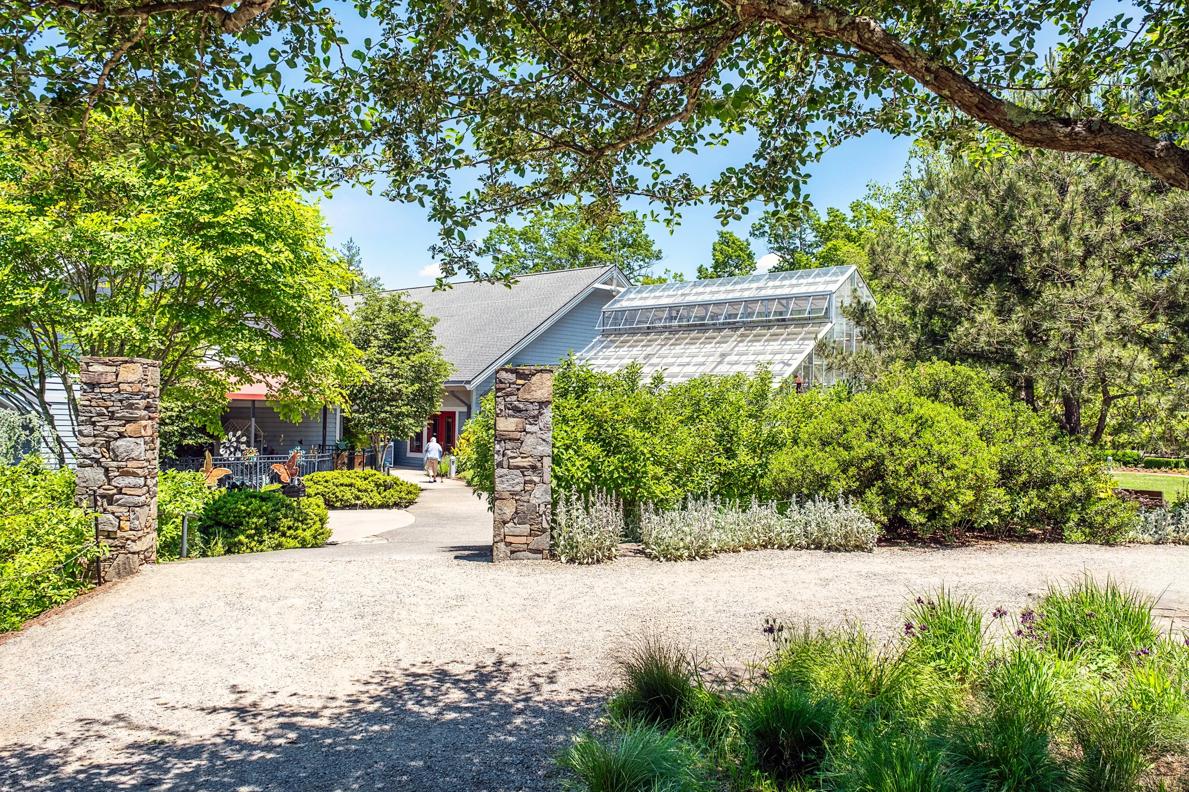 A quiet garden path and bonsai display at the North Carolina Arboretum near Asheville, North Carolina. Photographed by Lange Photo Studio. 