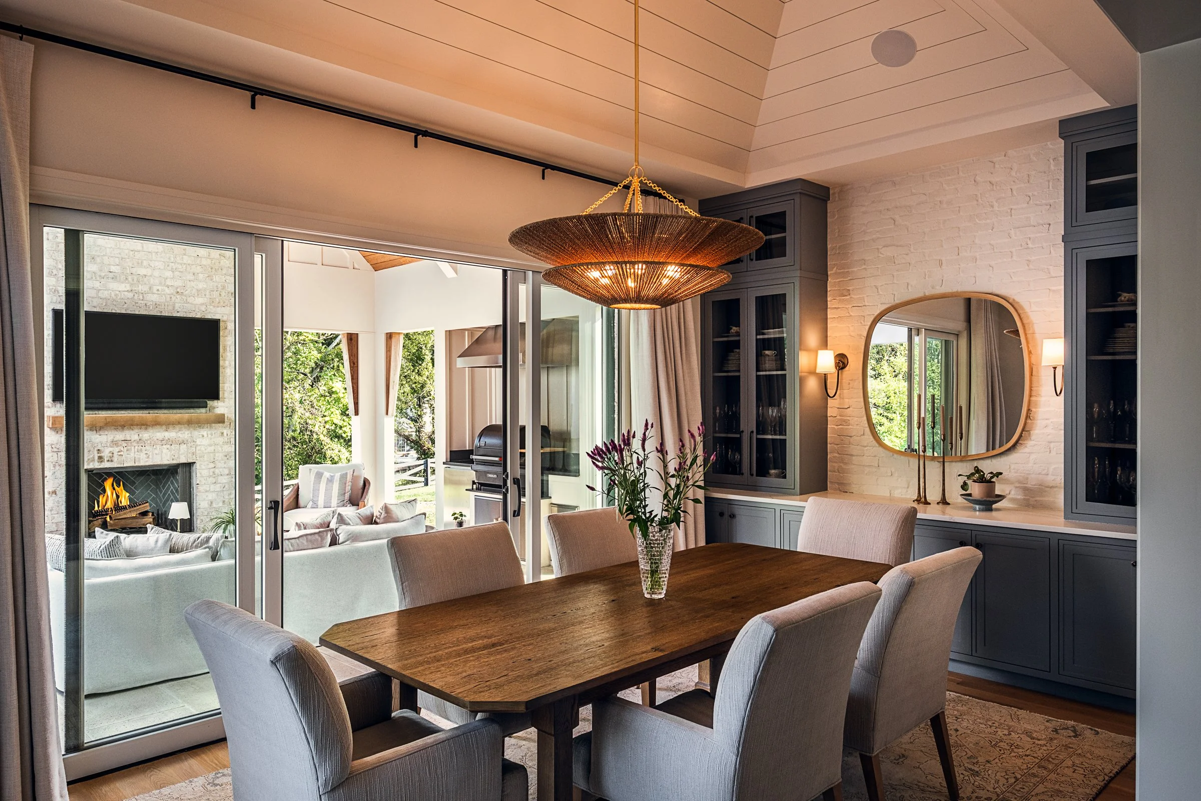 Architectural and interior photography of a custom home in Nashville, Tennessee, designed by Origin Architecture and photographed by Paul Lange of Lange Photo Studio. Warm light from the home’s fixtures highlights thoughtful architectural details and