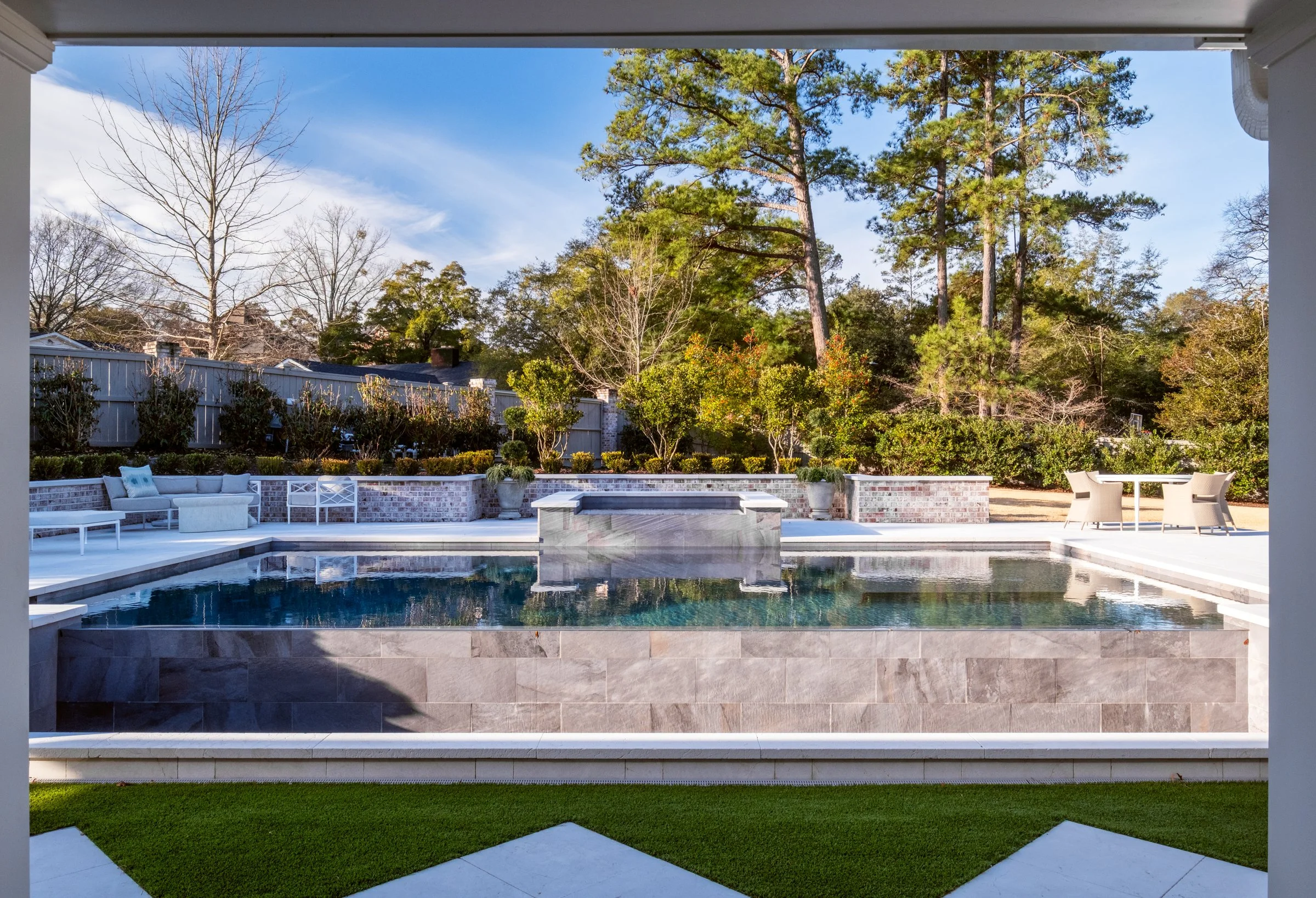 This luxury residential interior in Columbia, SC, designed by Westend Interiors and led by luxury interior designer Alisa Bunch, reflects a refined balance of texture, lighting, and curated furnishings. Photographed by Columbia and Charlotte-based ar