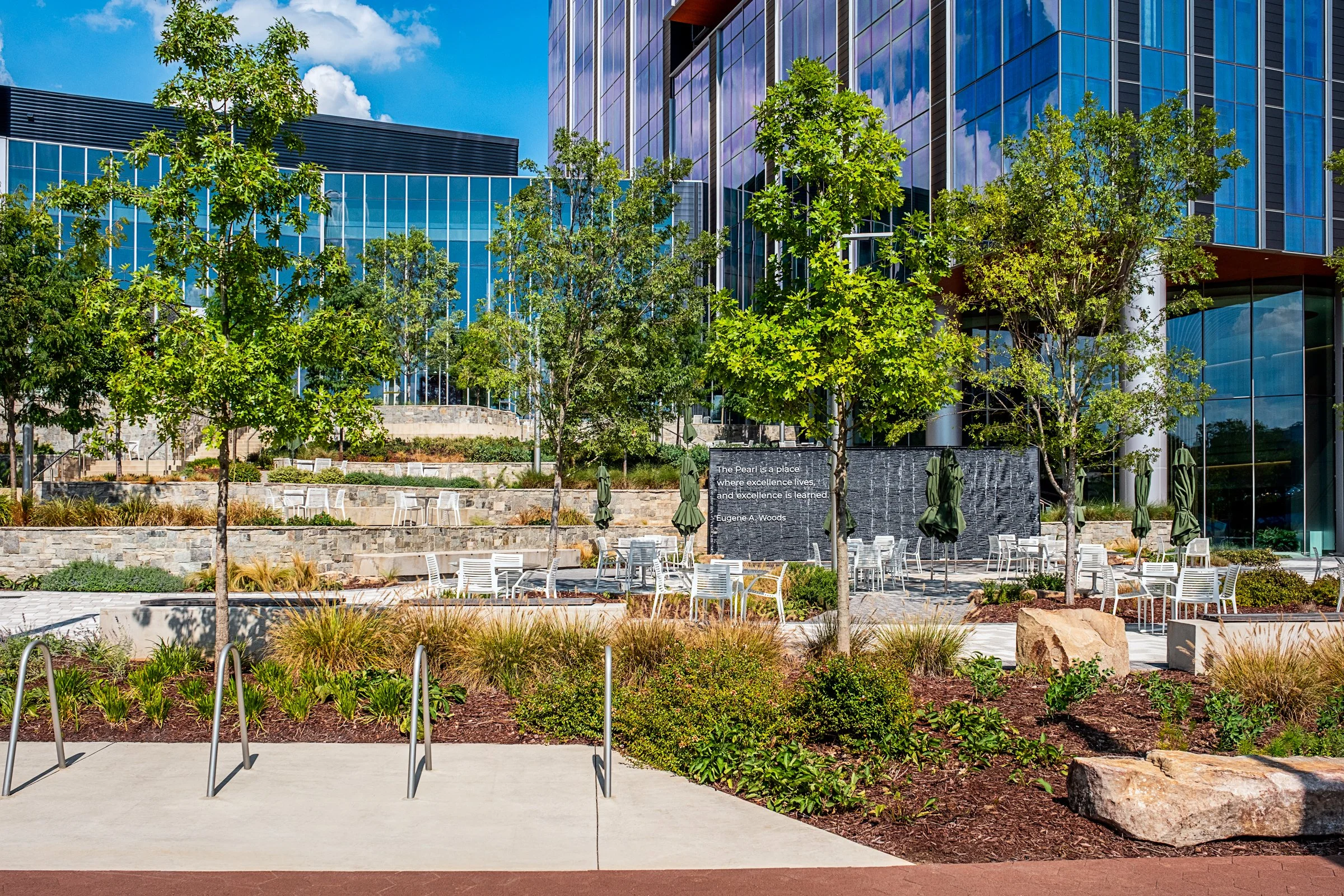 Landscape architecture photography of The Pearl in Charlotte, North Carolina, commissioned by Kimley-Horn and photographed by Paul Lange of Lange Photo Studio. The project features landscaped public spaces, a terraced central plaza, and the Purposefu