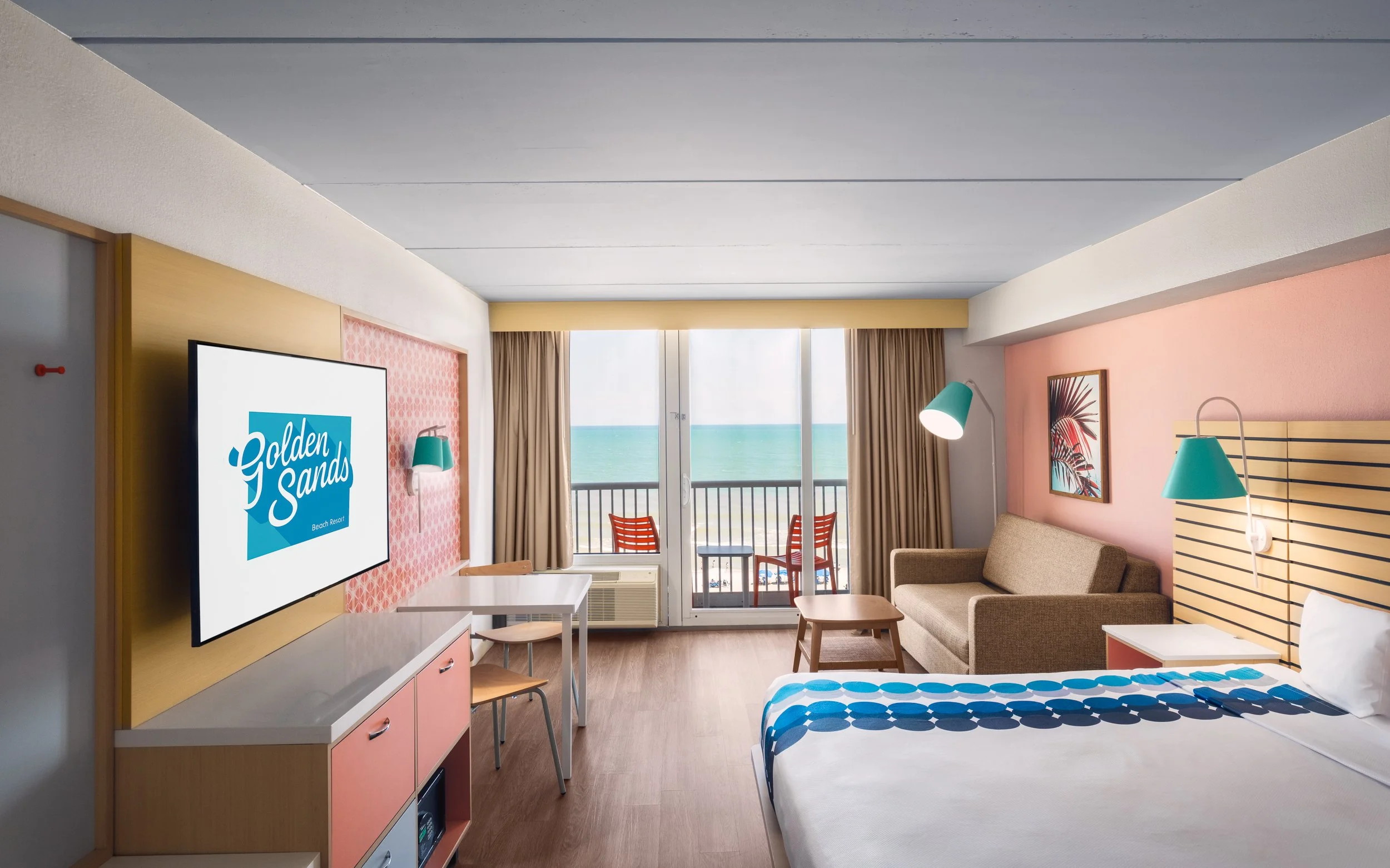 Warm hospitality photography of guest room at Golden Sands Hotel, showing thoughtful composition, branded consistency, and uncluttered guest environment.