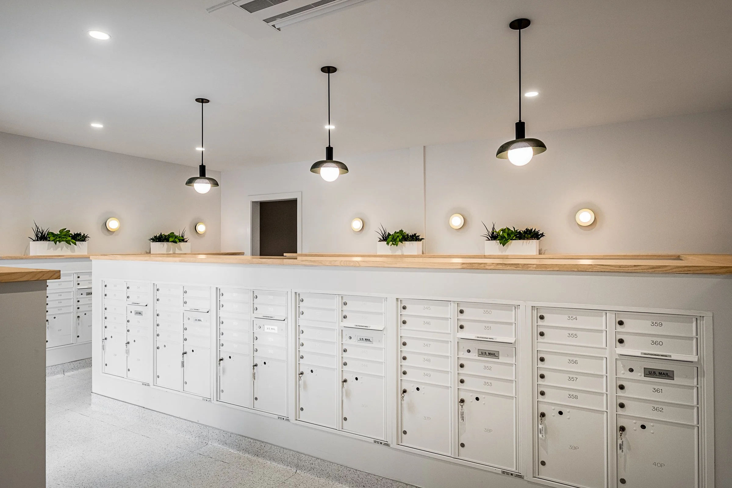 Architectural photography by Paul Lange of Lange Photo Studio, showcasing The Guild in Richmond, VA. The series captures the building's modern design, vibrant communal spaces, rooftop lounge, resort-style pool, highlighting the dynamic living experie