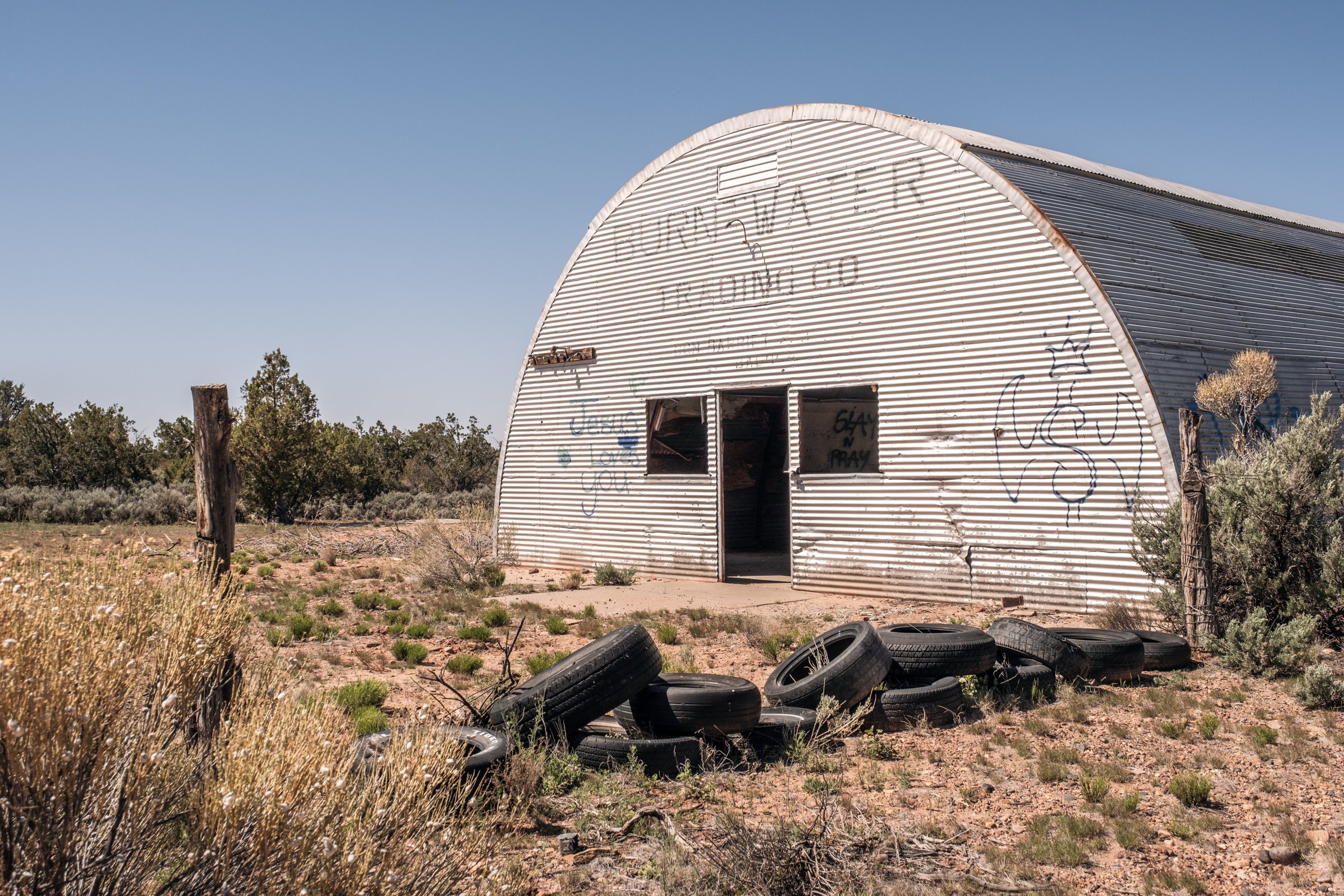 Hauling Life | Navajo Nation — Unified Metadata Paragraphs

Wayne Wilson and Joann Whiting collect water in Gallup, New Mexico at a community water source. The containers are filled, prepared, and loaded into their vehicle for transport across the Na