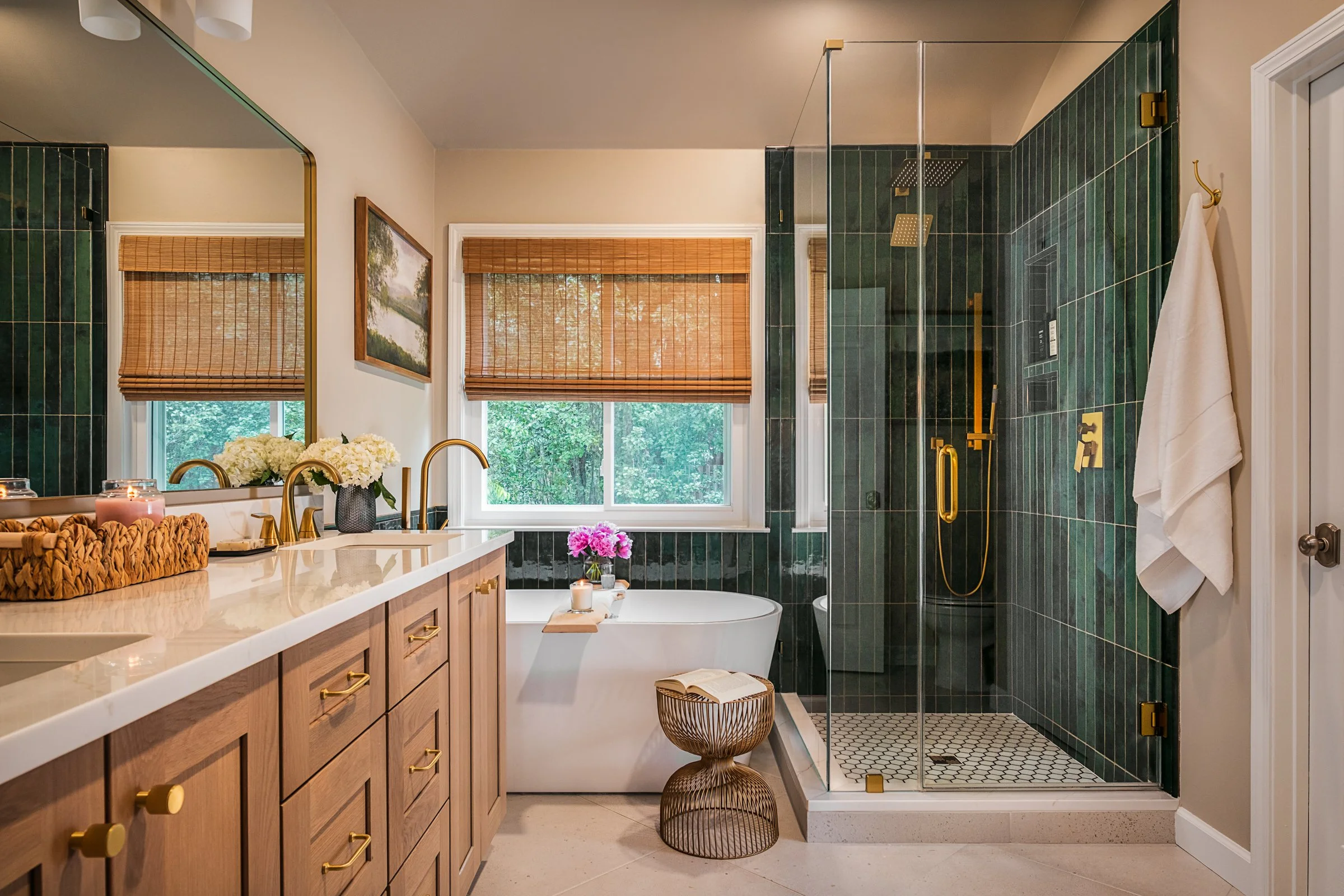 This luxury residential bathroom in North Carolina designed by Veritas Construction. Photographed by Charlotte-based architectural and interior photographer Paul Lange, this interior design photography series highlights custom wallpaper, and thoughtf