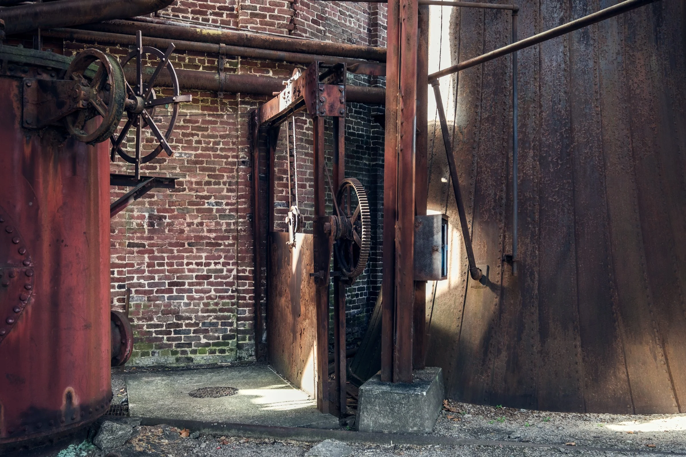 Sloss Furnaces, Birmingham, Alabama. Once the heart of the South's iron industry, these blast furnaces operated from 1882 to 1971, shaping Birmingham's identity as an industrial center. Now preserved as a National Historic Landmark, the site stands a