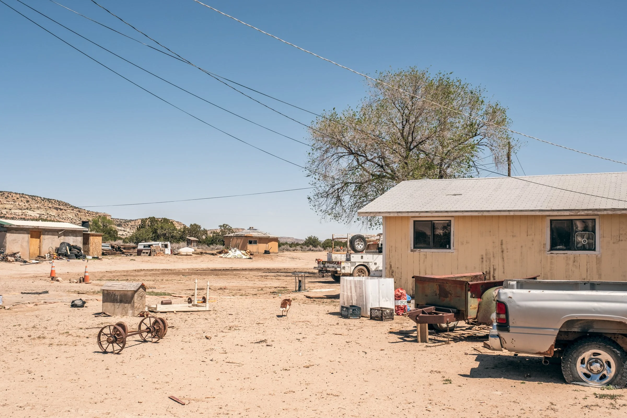 Hauling Life | Navajo Nation — Unified Metadata Paragraphs

Wayne Wilson and Joann Whiting collect water in Gallup, New Mexico at a community water source. The containers are filled, prepared, and loaded into their vehicle for transport across the Na