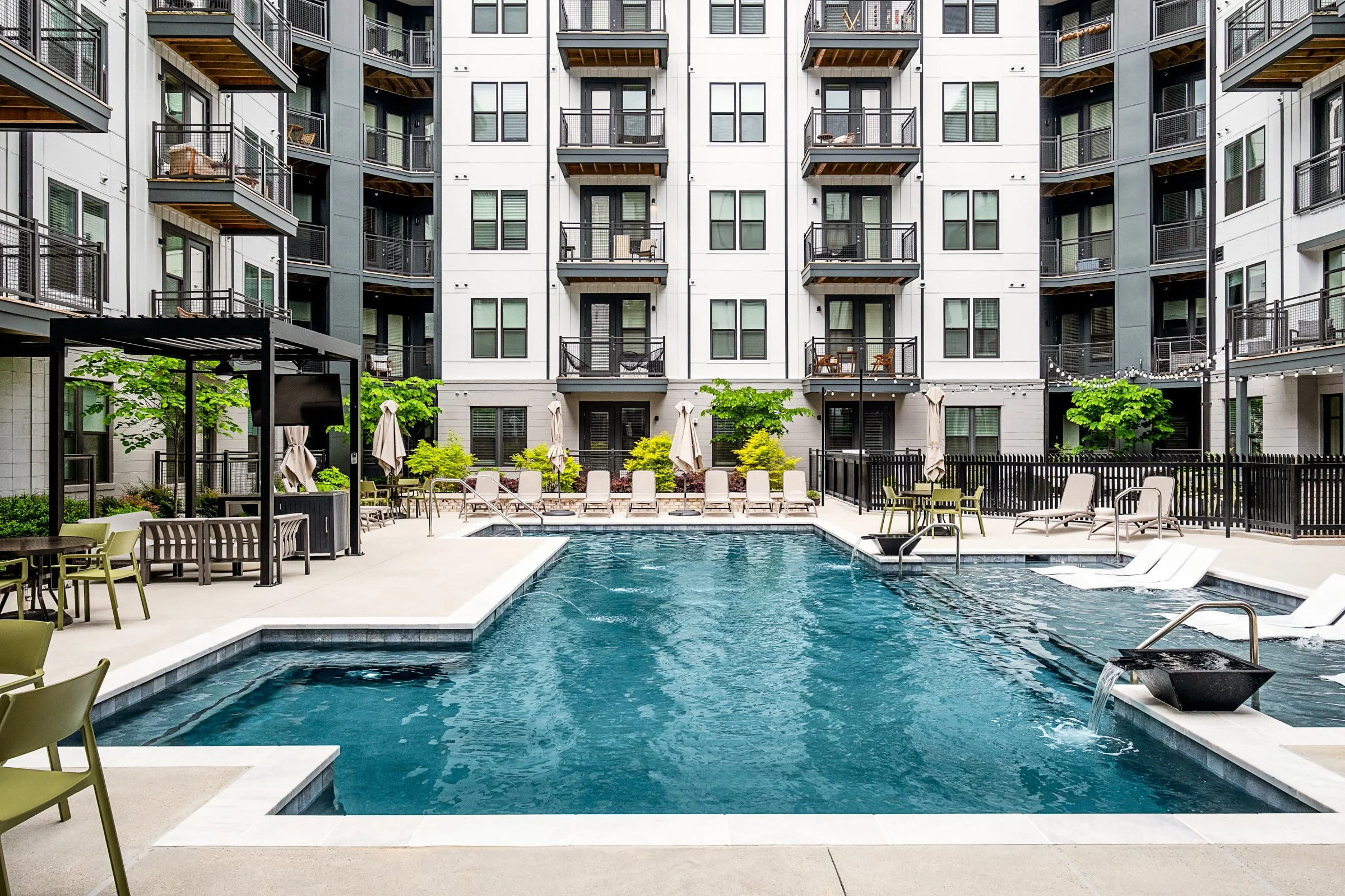 Architectural photography by Paul Lange of Lange Photo Studio, showcasing The Alder in Richmond, VA. The series captures the building's modern design, vibrant communal spaces, rooftop lounge, resort-style pool, highlighting the dynamic living experie