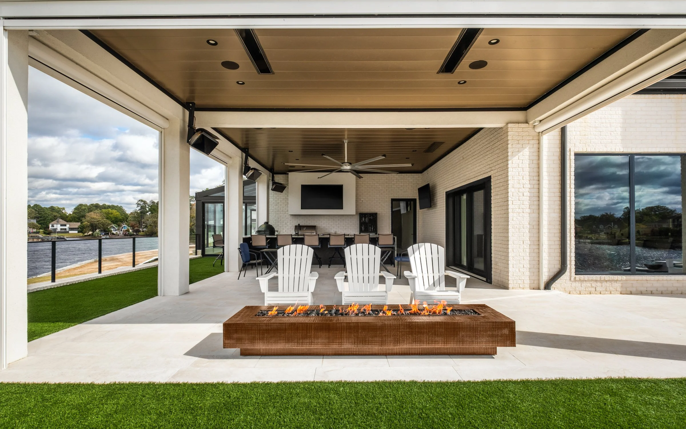 Architectural and interior photography of a customized lakefront home, highlighting design detail, atmosphere, infinity pool, and craftsmanship.