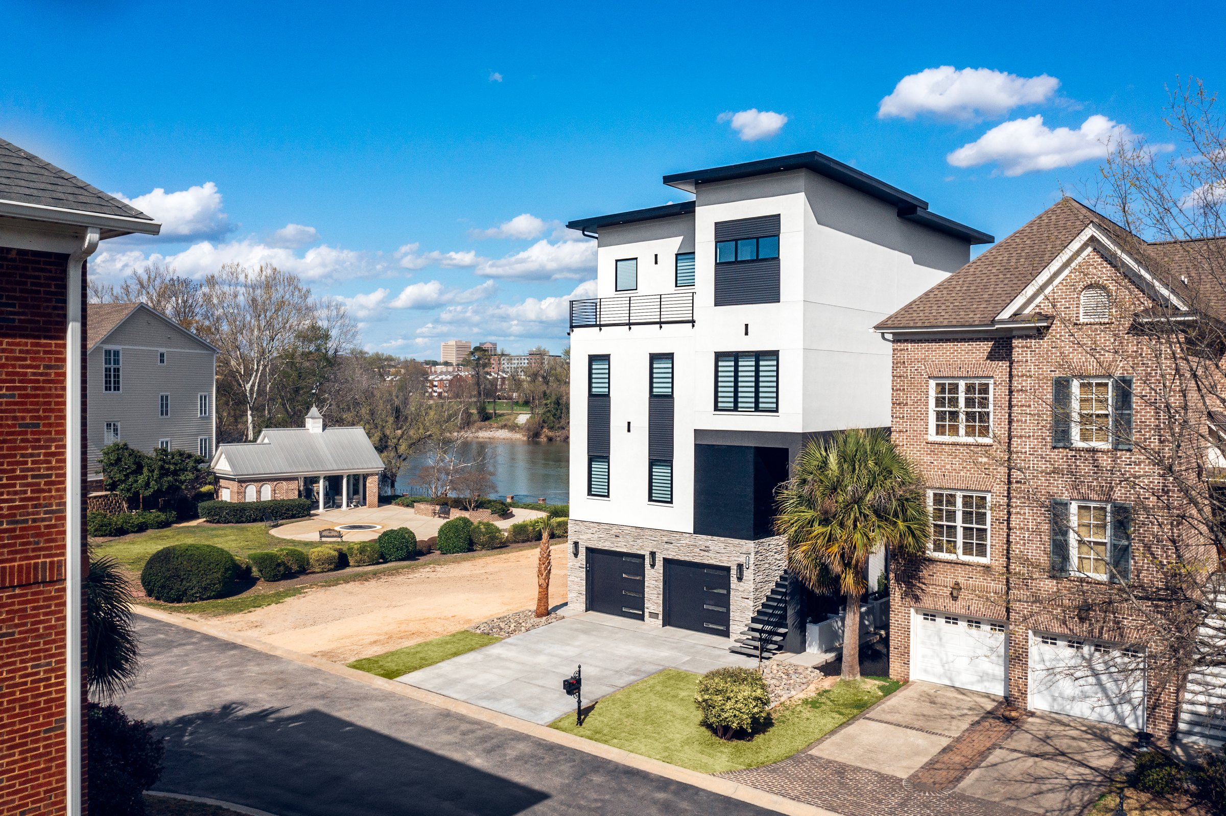 Architectural and interior photography of a customized lakefront home, highlighting design detail, atmosphere, infinity pool, and craftsmanship.