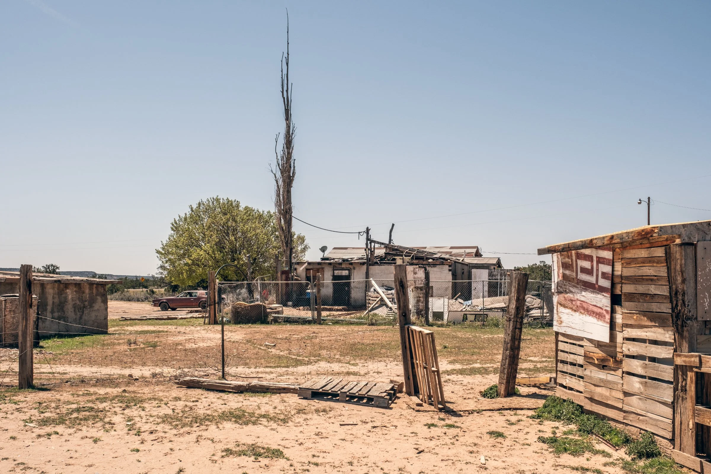 Hauling Life | Navajo Nation — Unified Metadata Paragraphs

Wayne Wilson and Joann Whiting collect water in Gallup, New Mexico at a community water source. The containers are filled, prepared, and loaded into their vehicle for transport across the Na