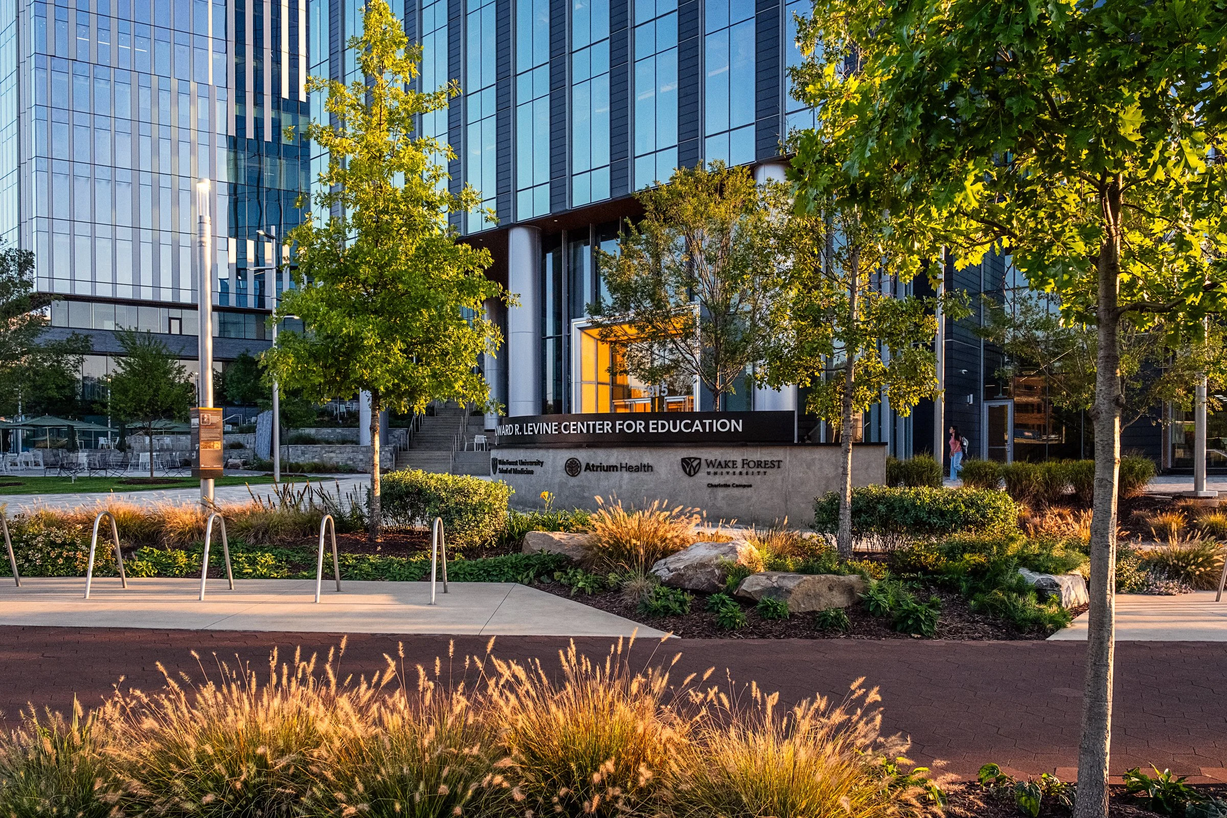 Landscape architecture photography of The Pearl in Charlotte, North Carolina, commissioned by Kimley-Horn and photographed by Paul Lange of Lange Photo Studio. The project features landscaped public spaces, a terraced central plaza, and the Purposefu