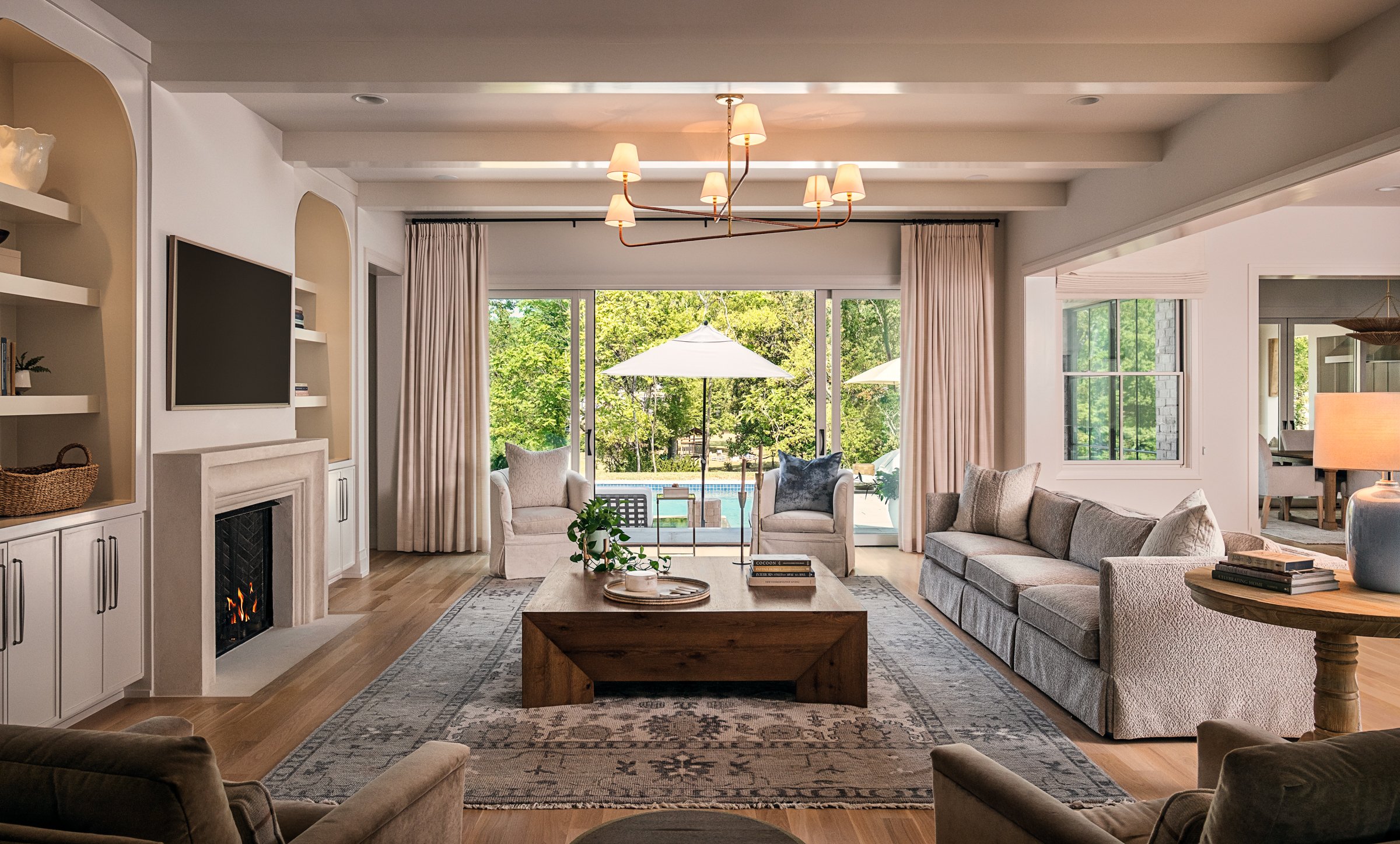 Architectural and interior photography of a custom home in Nashville, Tennessee, designed by Origin Architecture and photographed by Paul Lange of Lange Photo Studio. Warm light from the home’s fixtures highlights thoughtful architectural details and